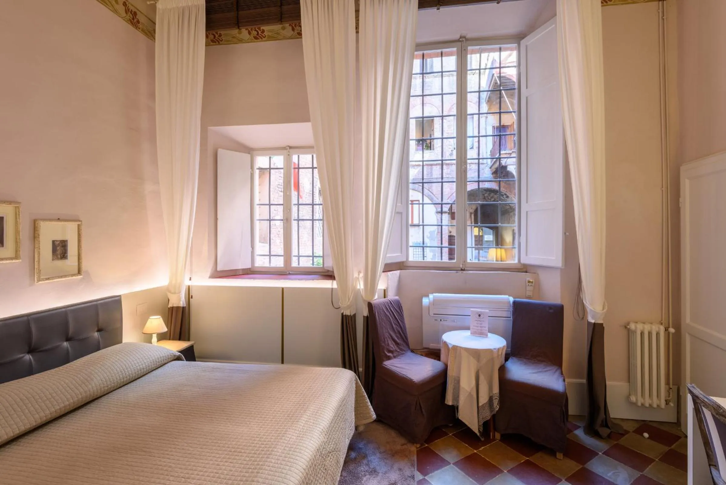 Bed in La Terrazza Sul Campo-Rooms Only