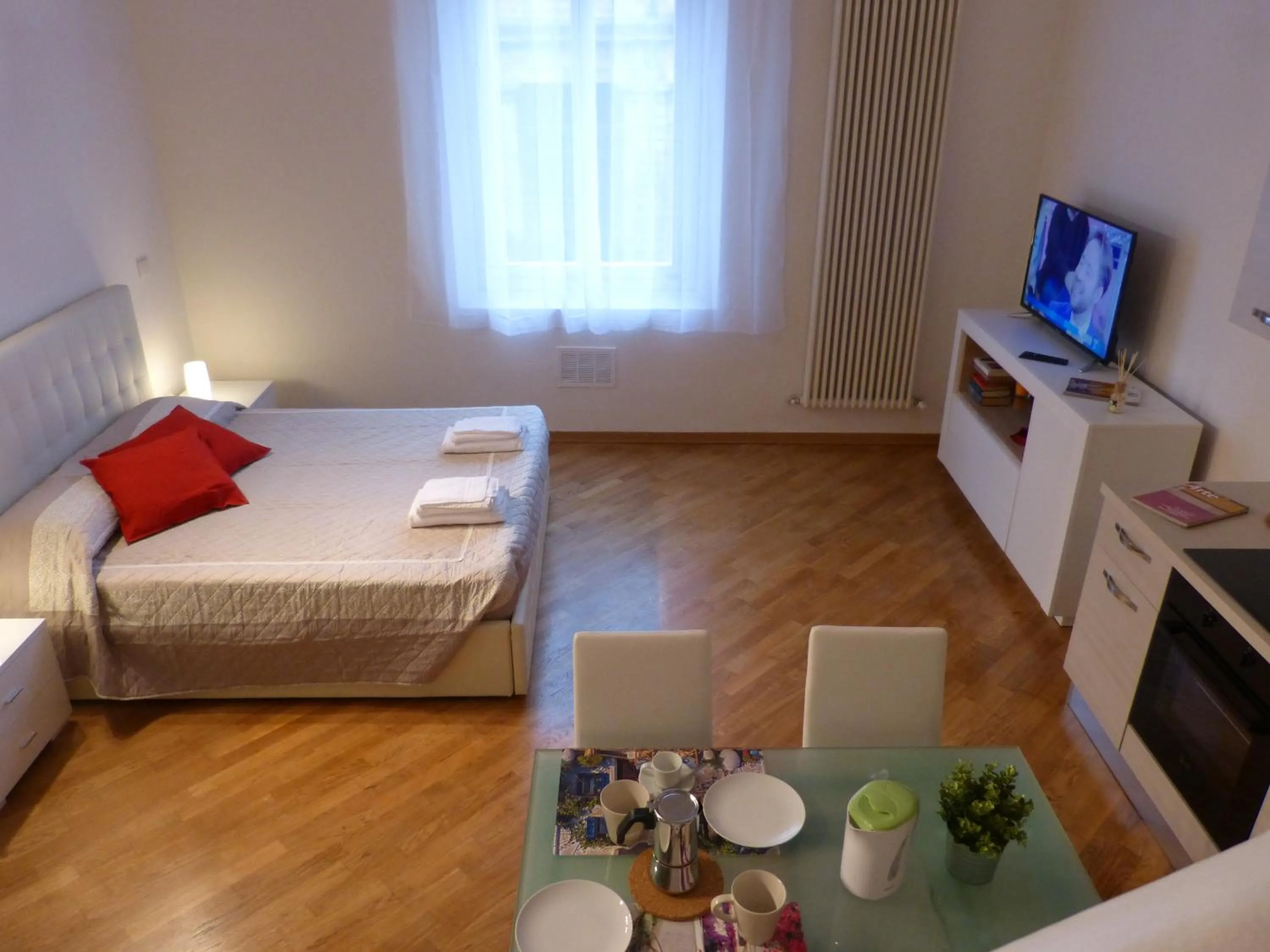 Photo of the whole room, Bed in Residenza Piazza Santo Stefano