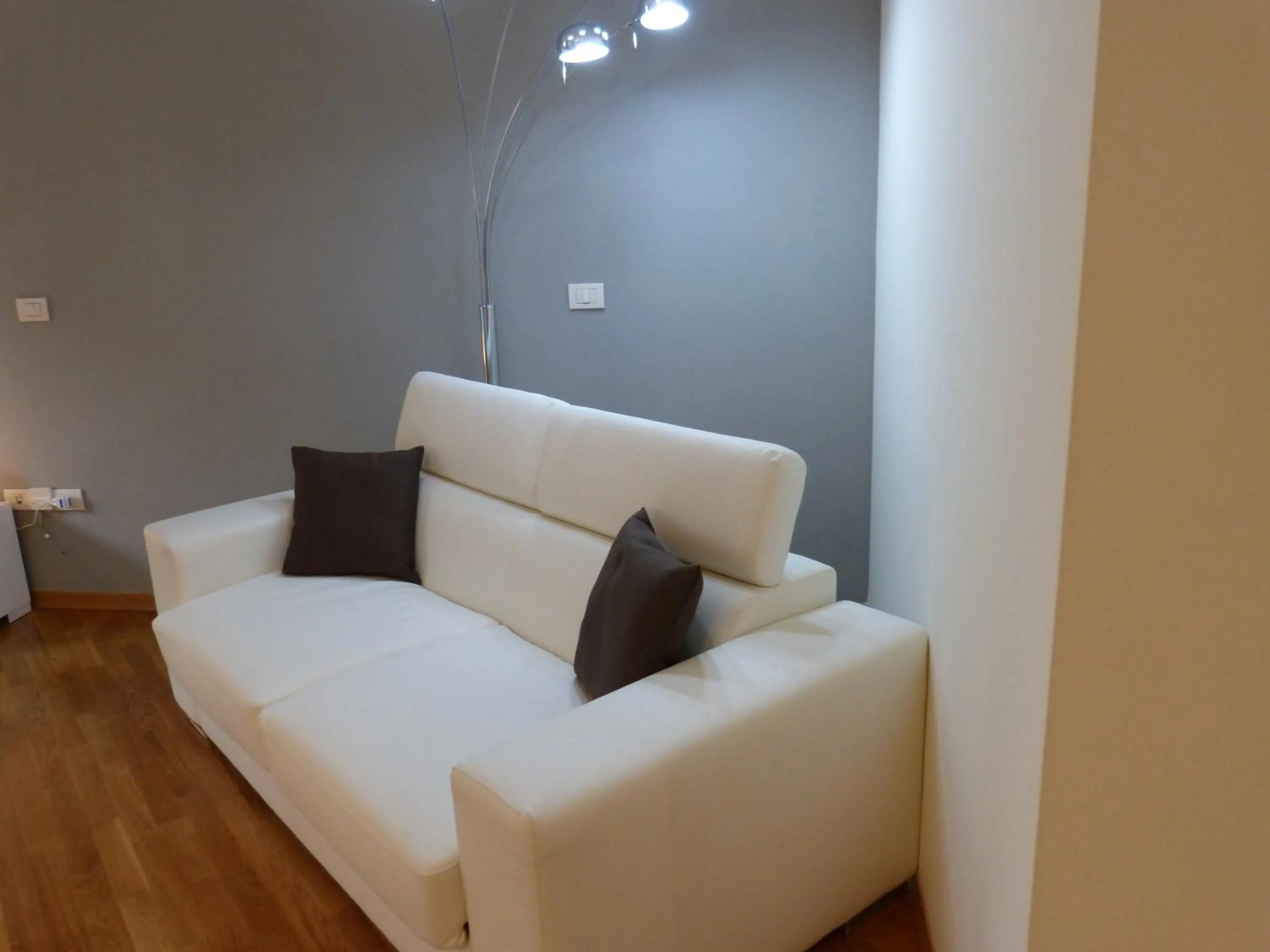 Living room, Bed in Residenza Piazza Santo Stefano