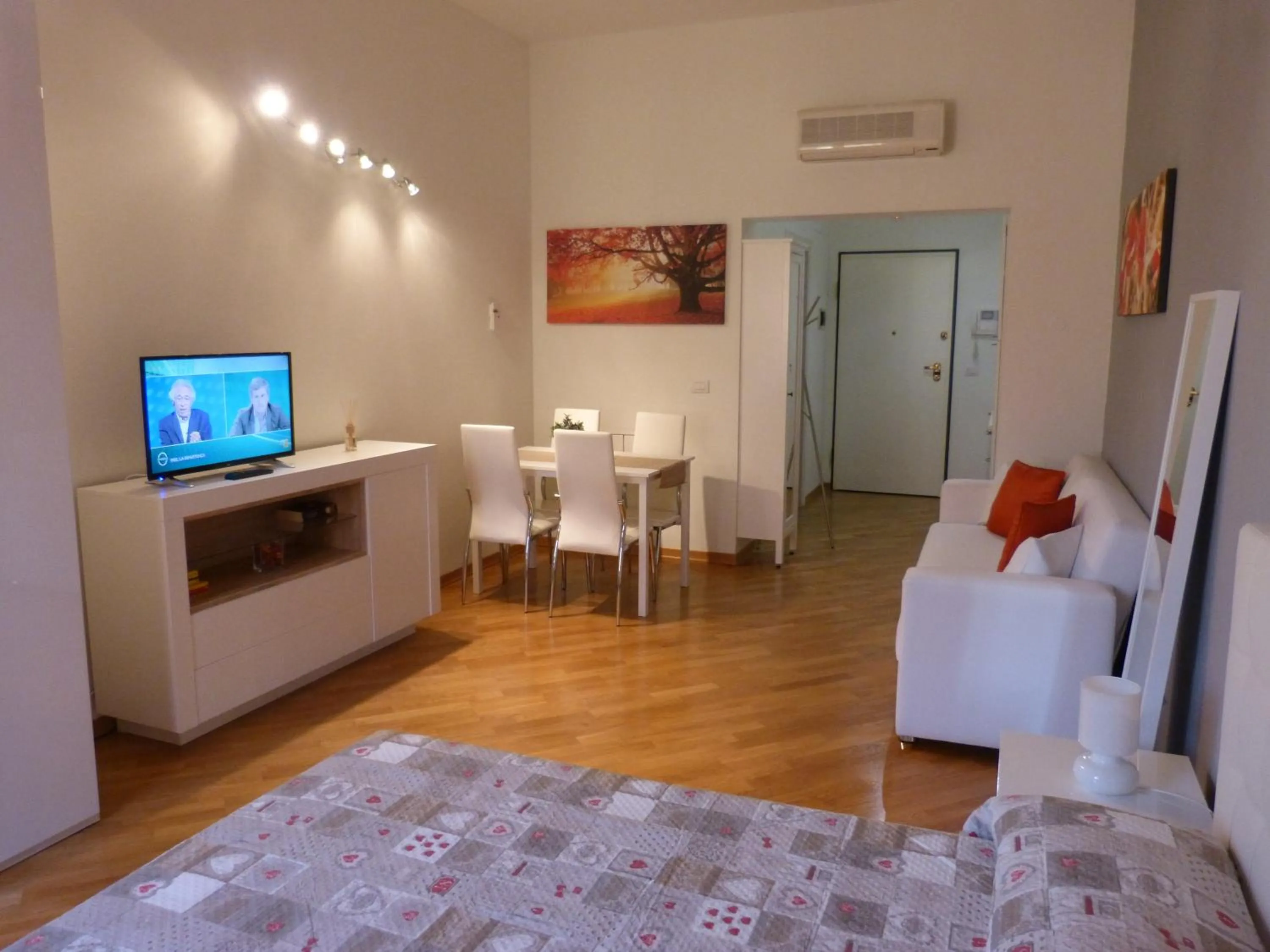 Living room, Bed in Residenza Piazza Santo Stefano