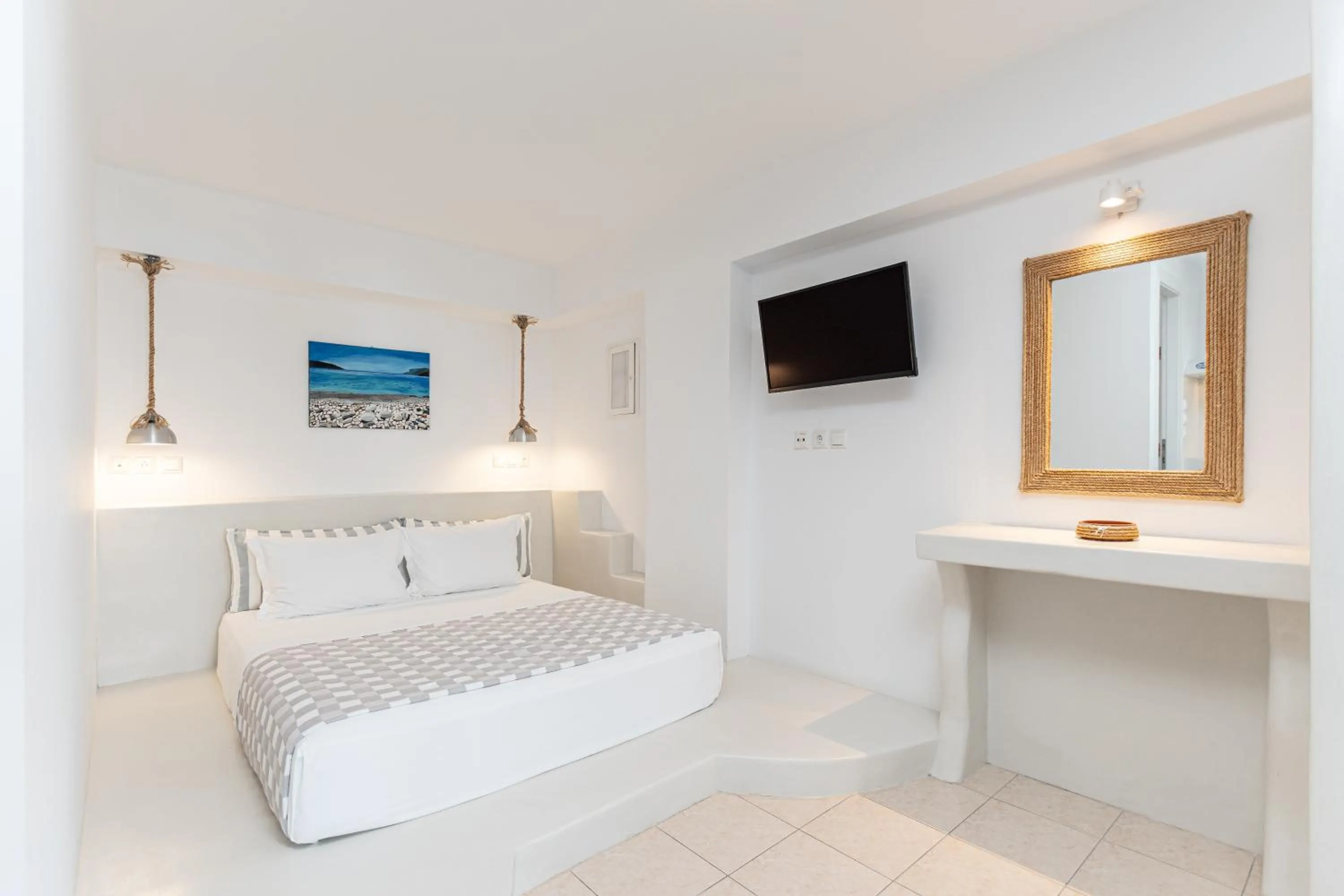 Bed in Annita's Village Hotel