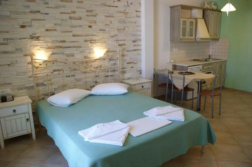 Bed in Annita's Village Hotel