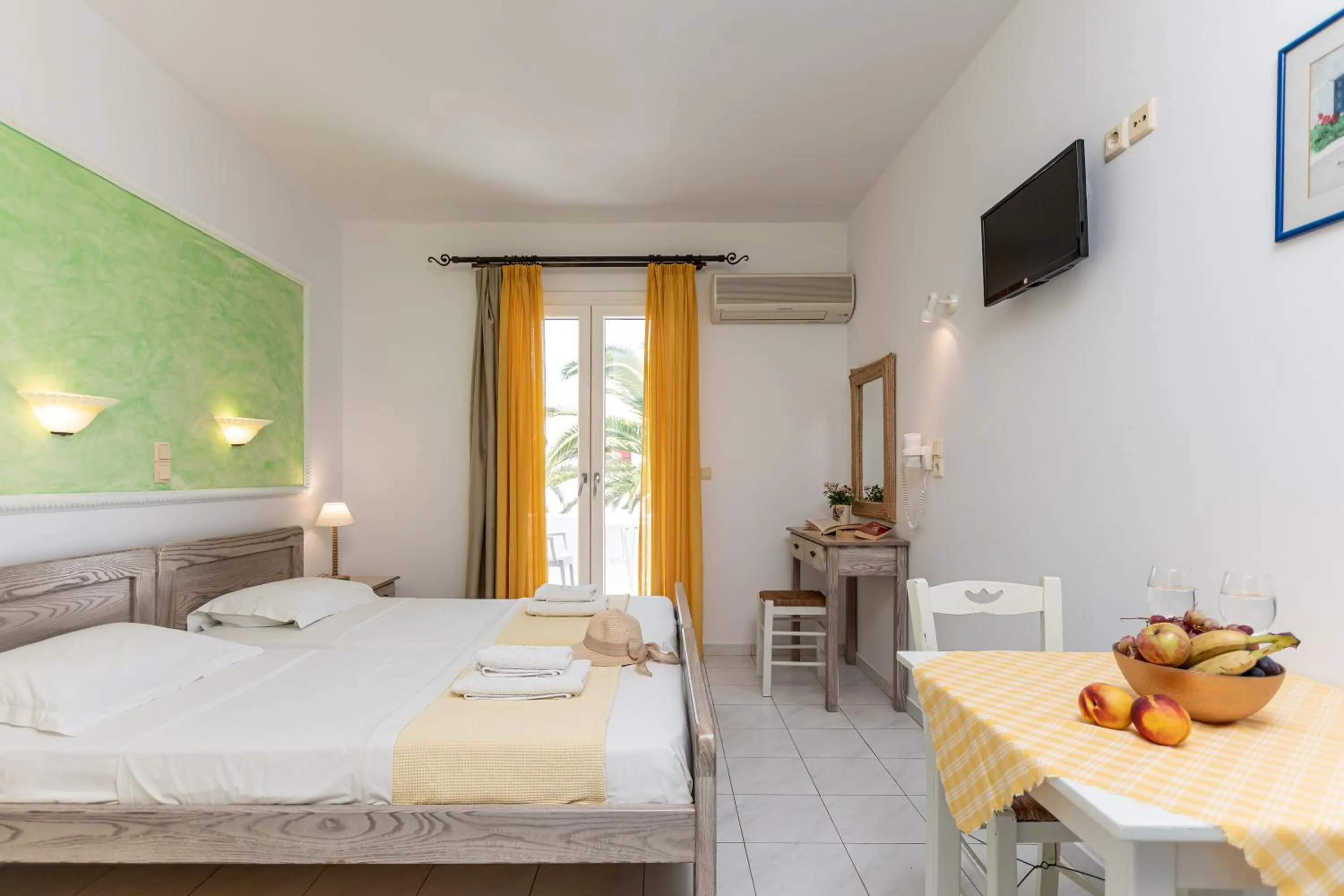 Bed in Annita's Village Hotel