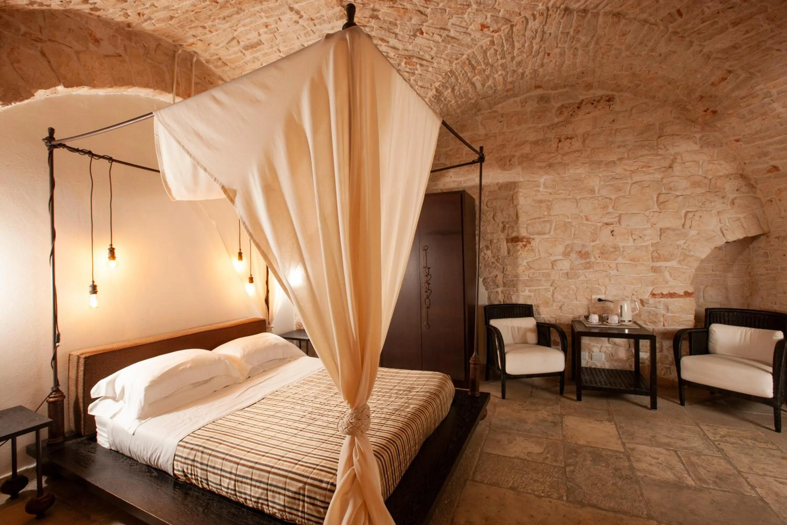 Bed in Le Alcove - Luxury Hotel nei Trulli