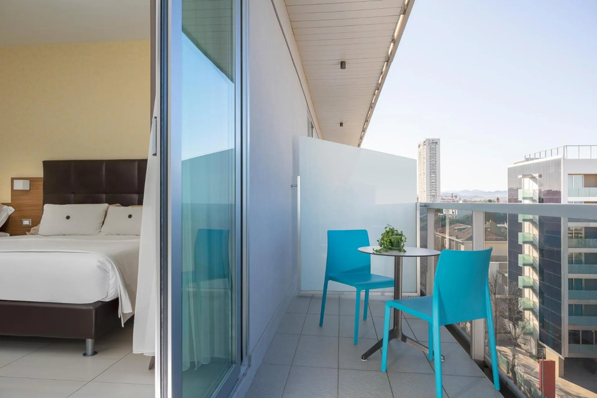 Balcony/Terrace, Bed in Aqua Hotel