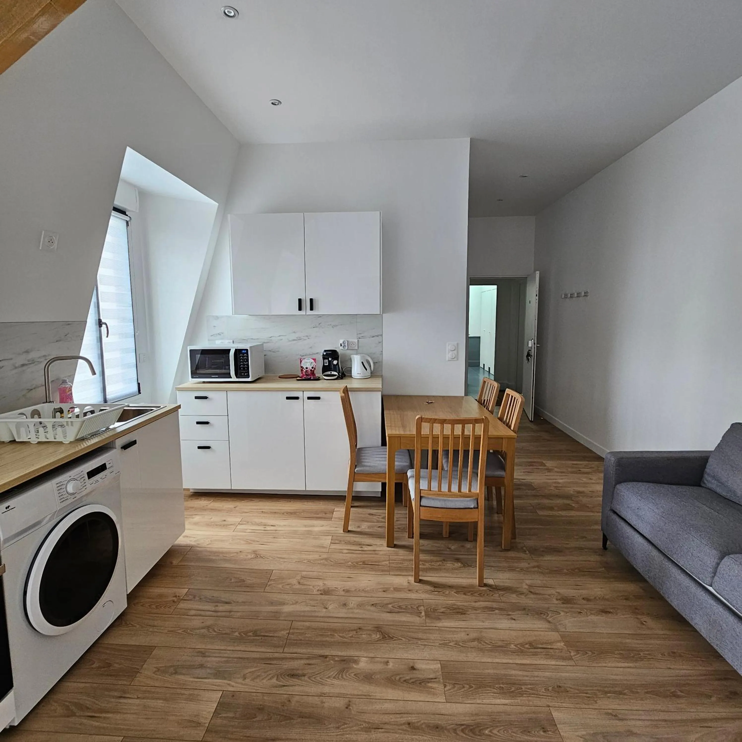 Kitchen or kitchenette in Résidence Hôtel Le Relais Amélie