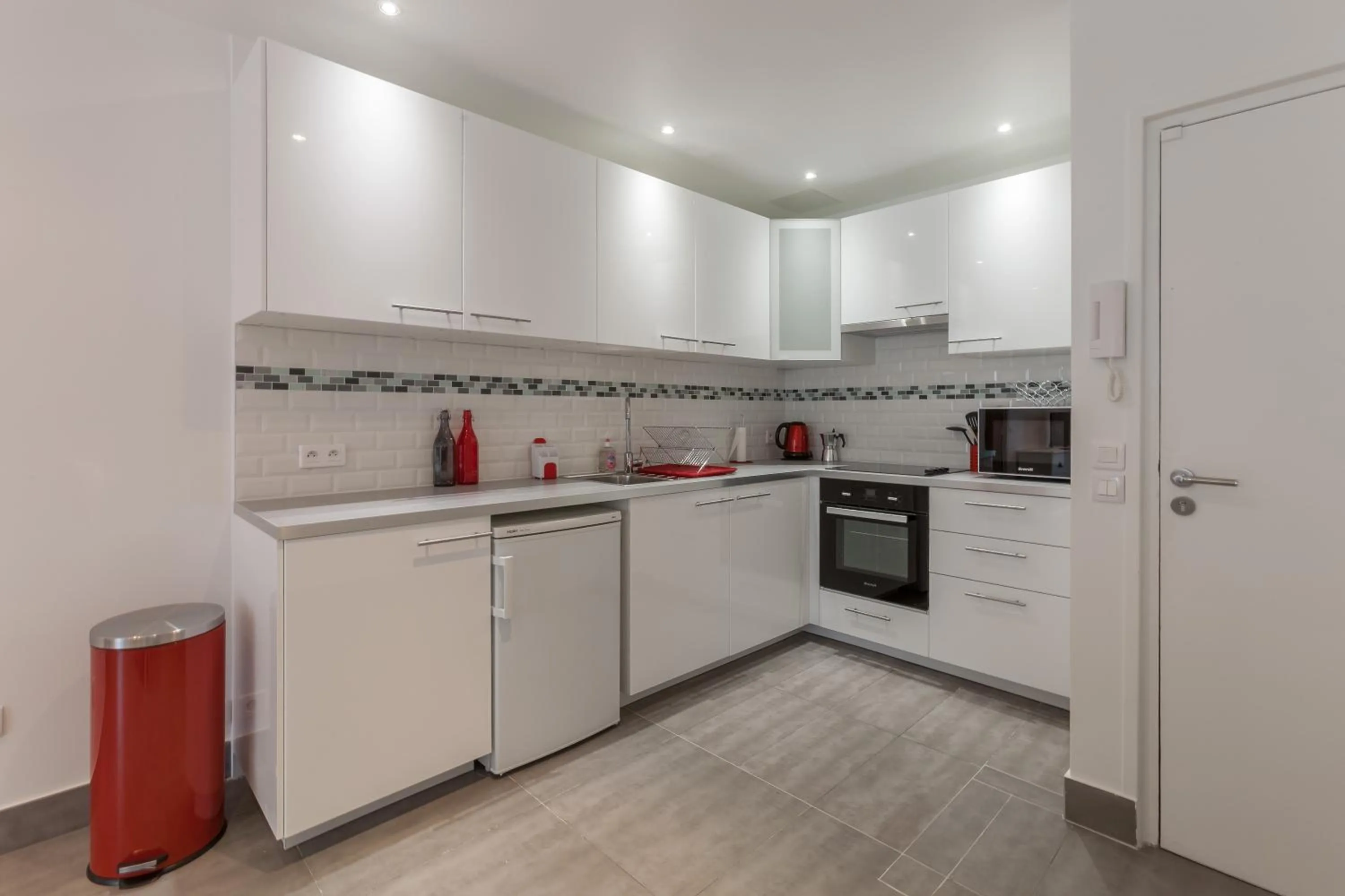 Kitchen or kitchenette in Résidence Hôtel Le Relais Amélie