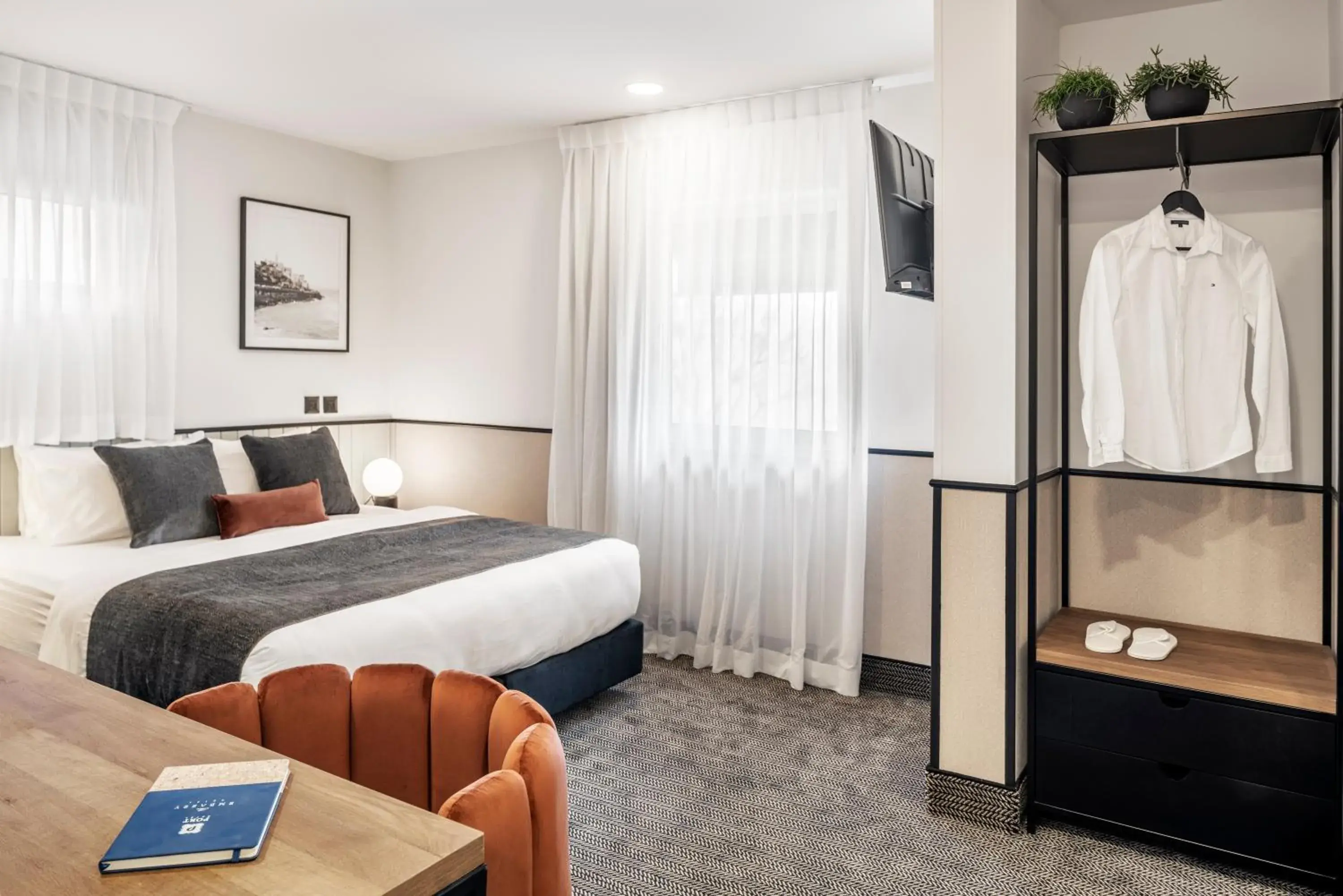 Photo of the whole room, Bed in The New Port Hotel TLV Photo of the whole room, Bed in The New Port Hotel TLV