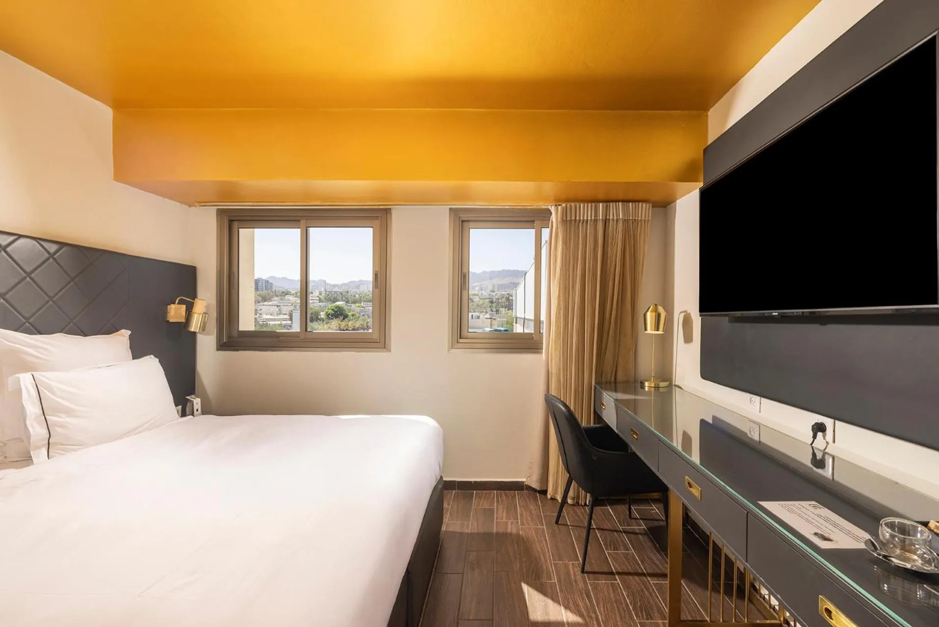 Bed in EVE Eilat by Adam Hotels