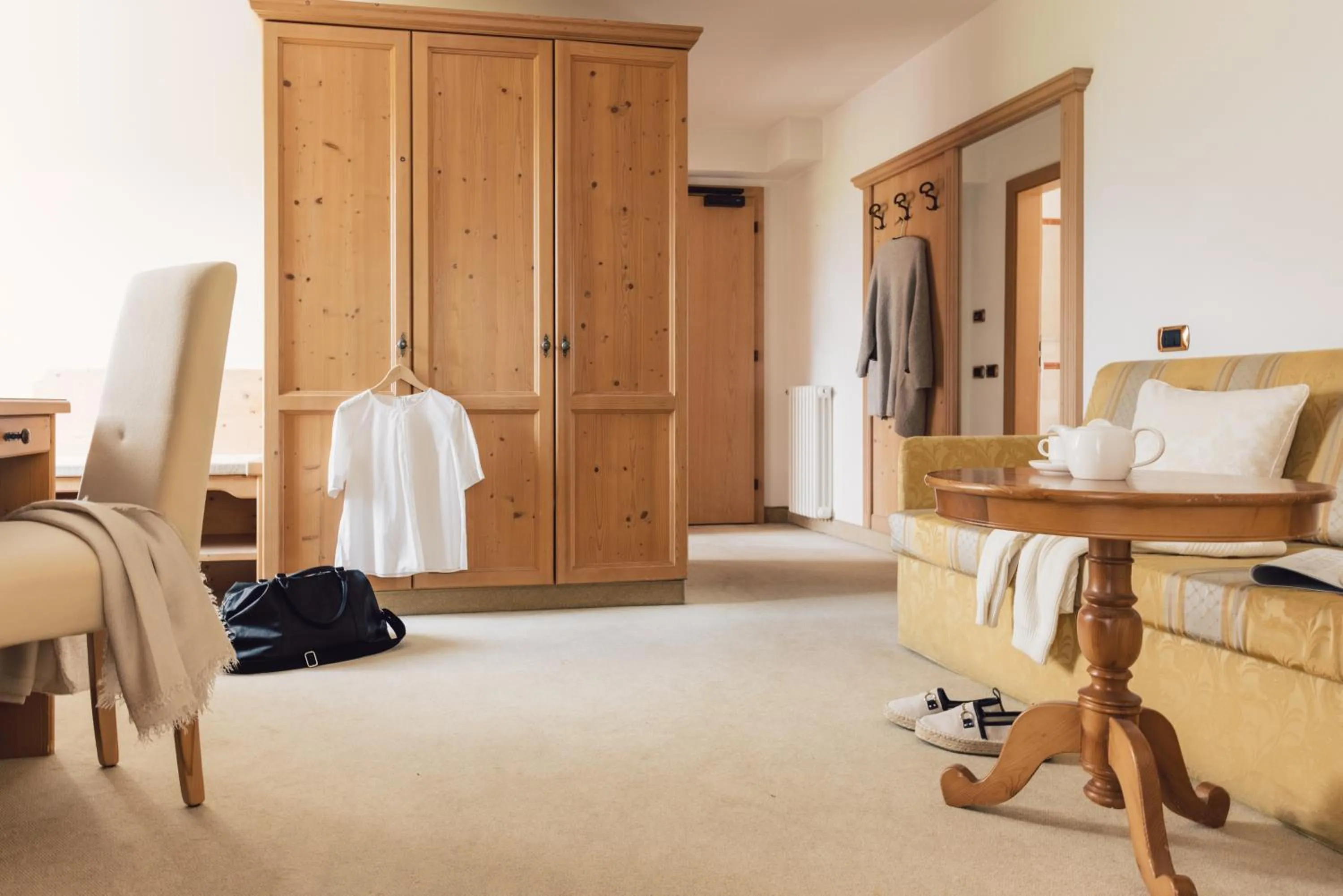 Living room, Bed in Wellness Refugium & Resort Hotel Alpin Royal - Small Luxury Hotels of the World