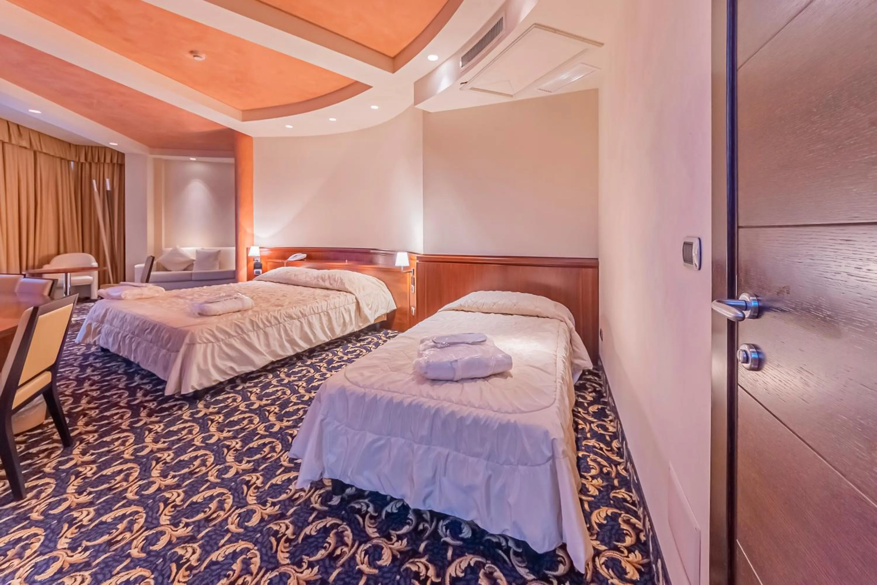 Bed in Dado Hotel International