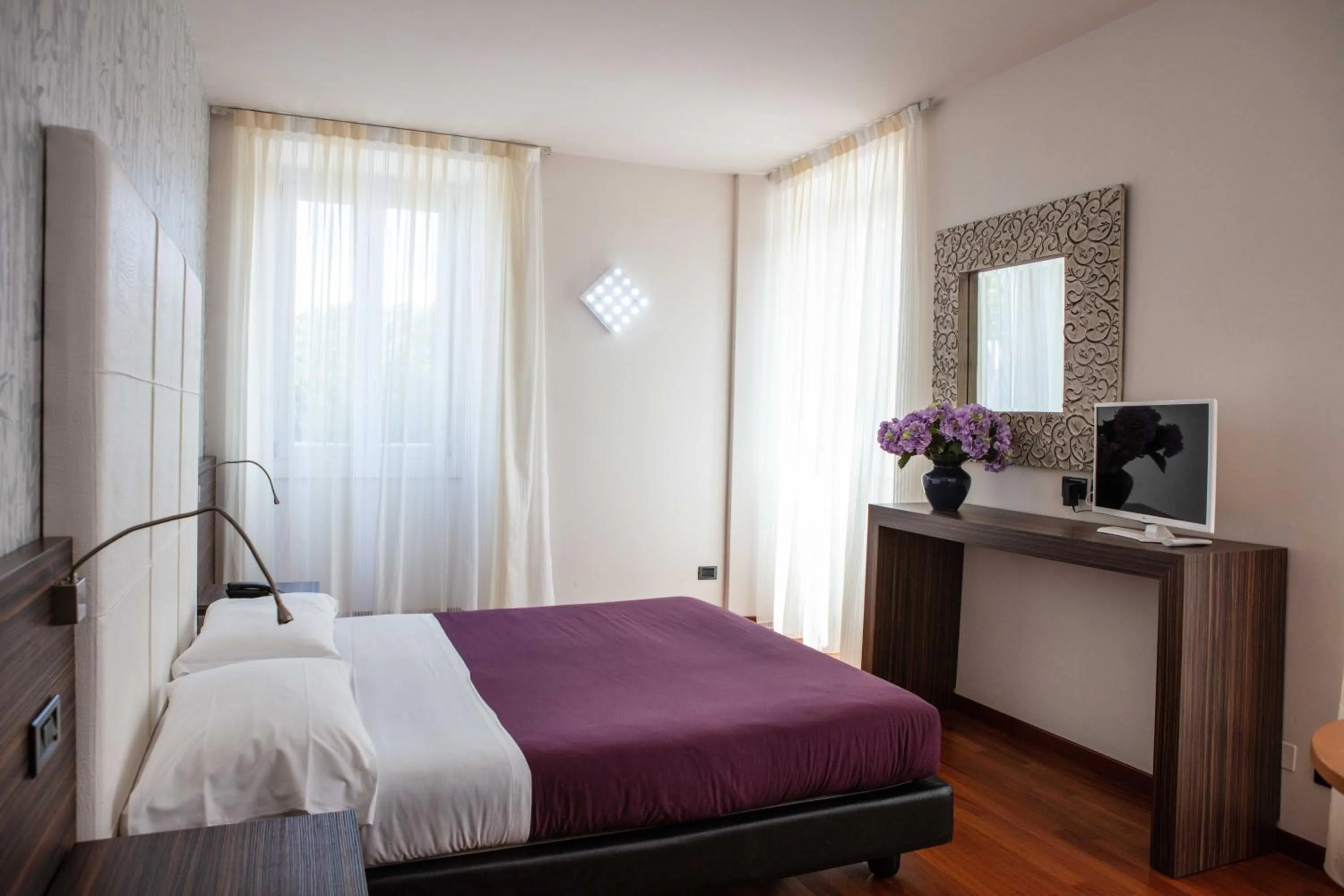 Bed in Hotel Vittorio