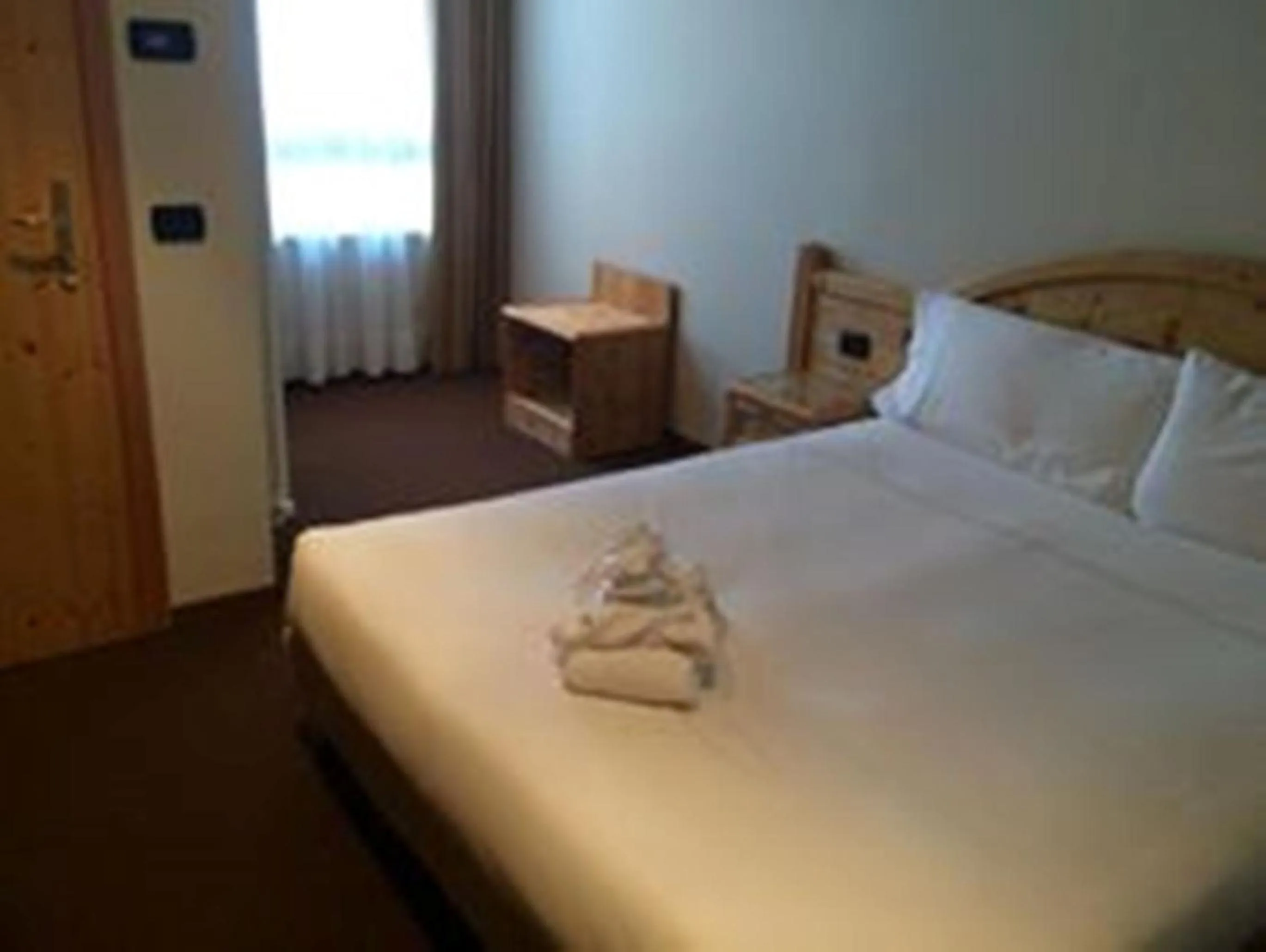 Bed in Grand Hotel Paradiso