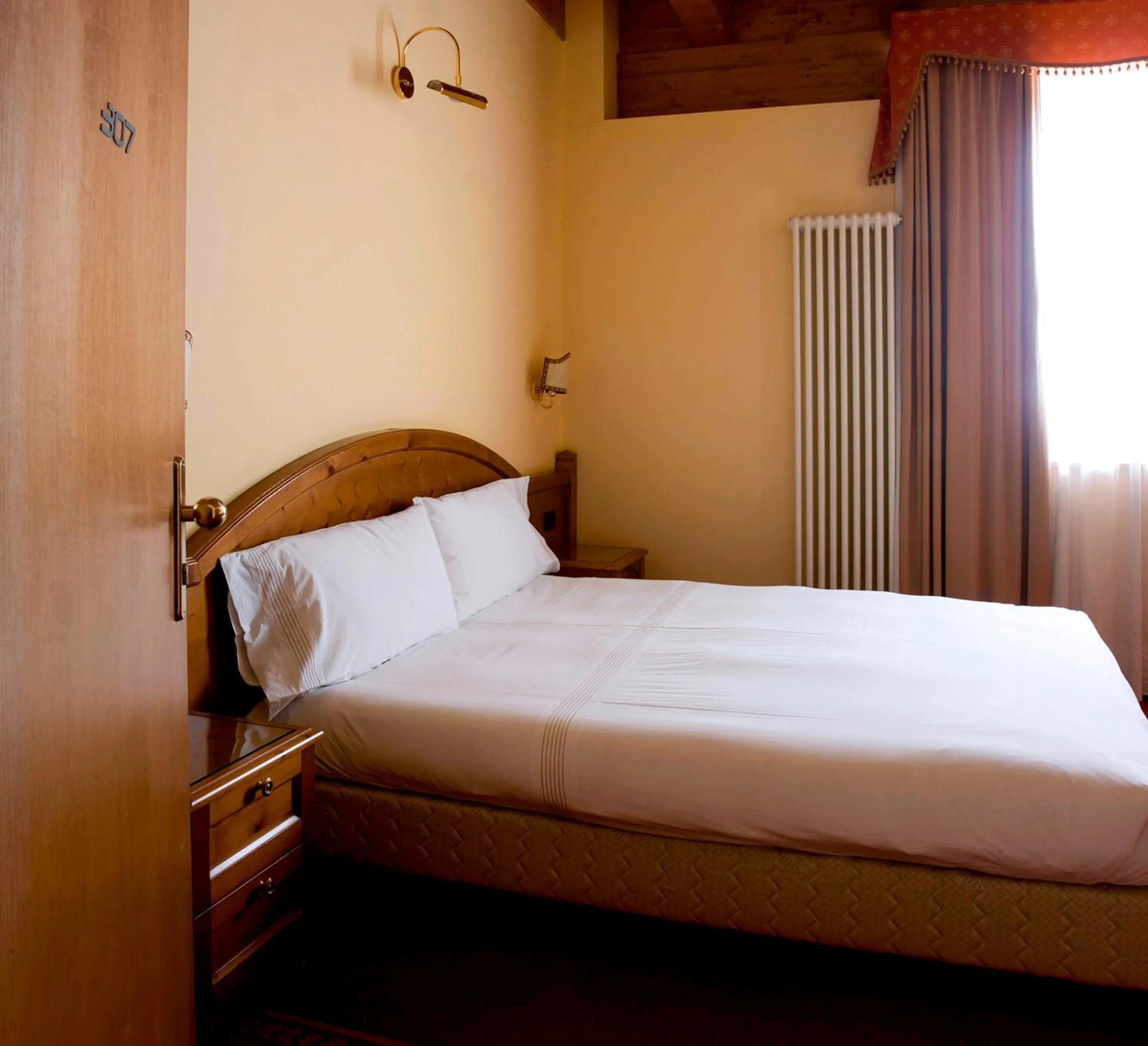 Bed in Grand Hotel Paradiso