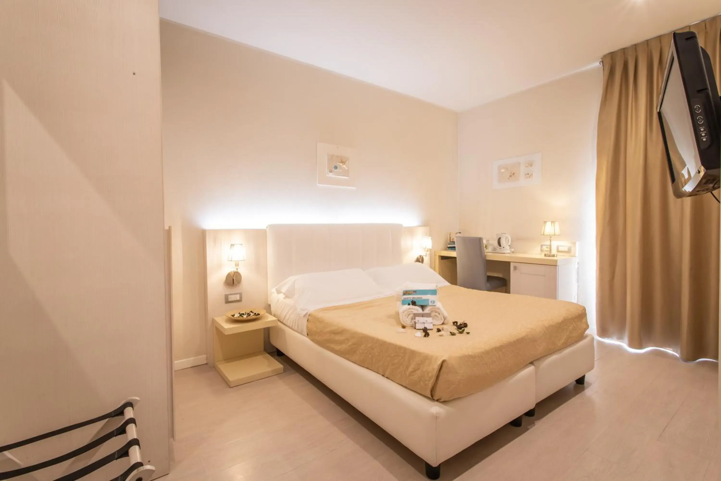 Photo of the whole room, Bed in Ferretti Beach Hotel Photo of the whole room, Bed in Ferretti Beach Hotel