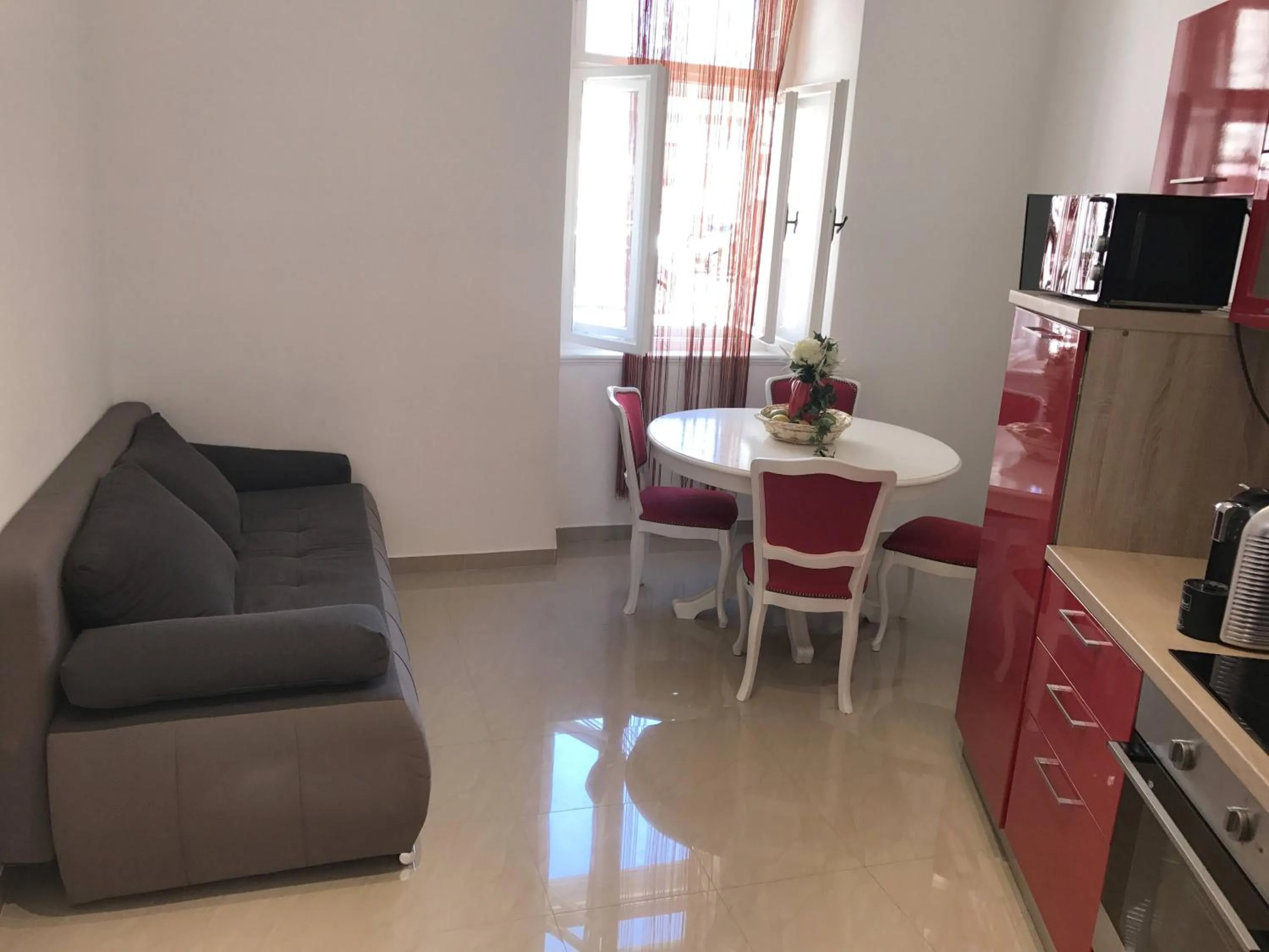 Kitchen or kitchenette in Pula Antic Rooms in Center