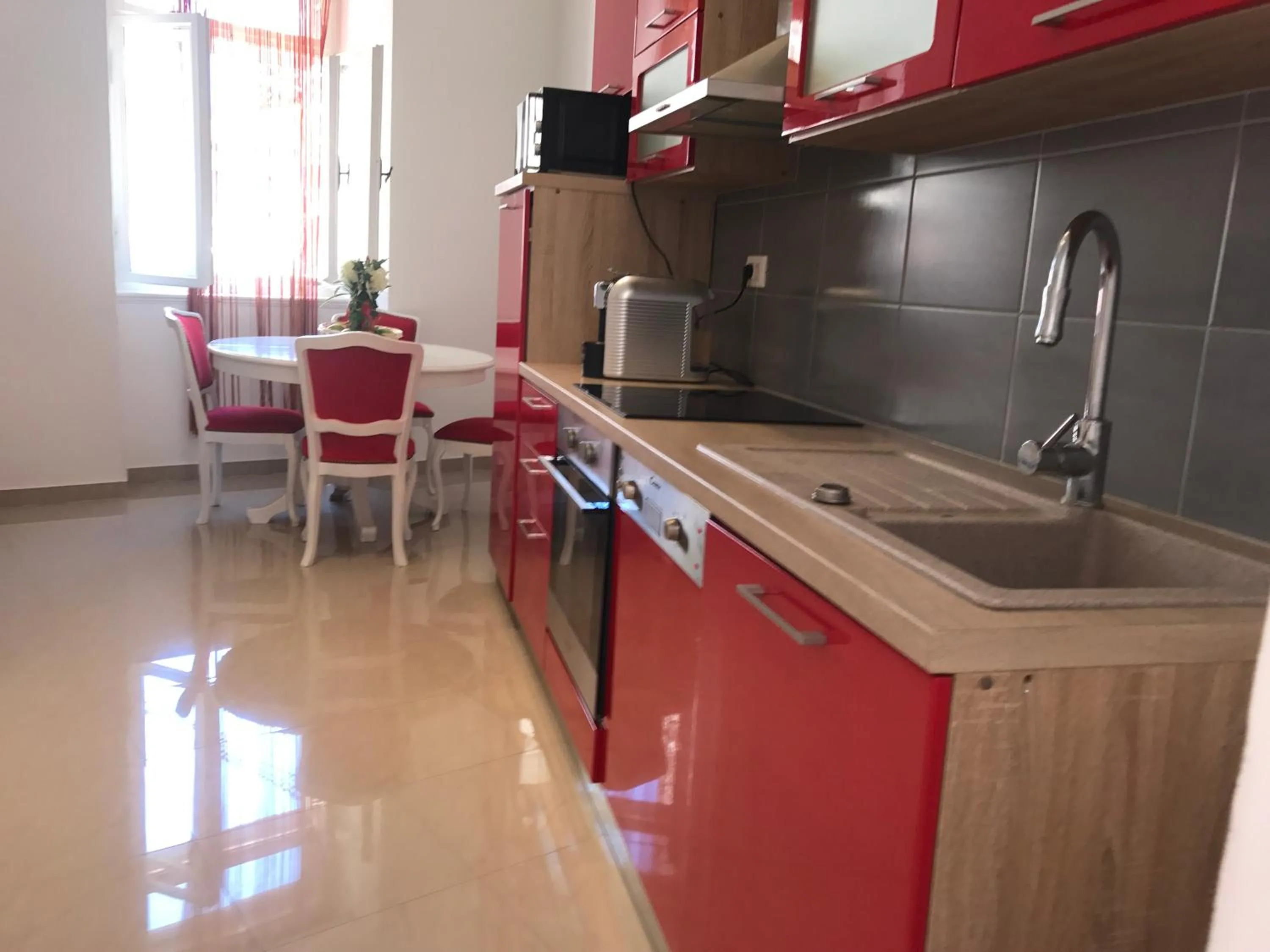 Kitchen or kitchenette in Pula Antic Rooms in Center