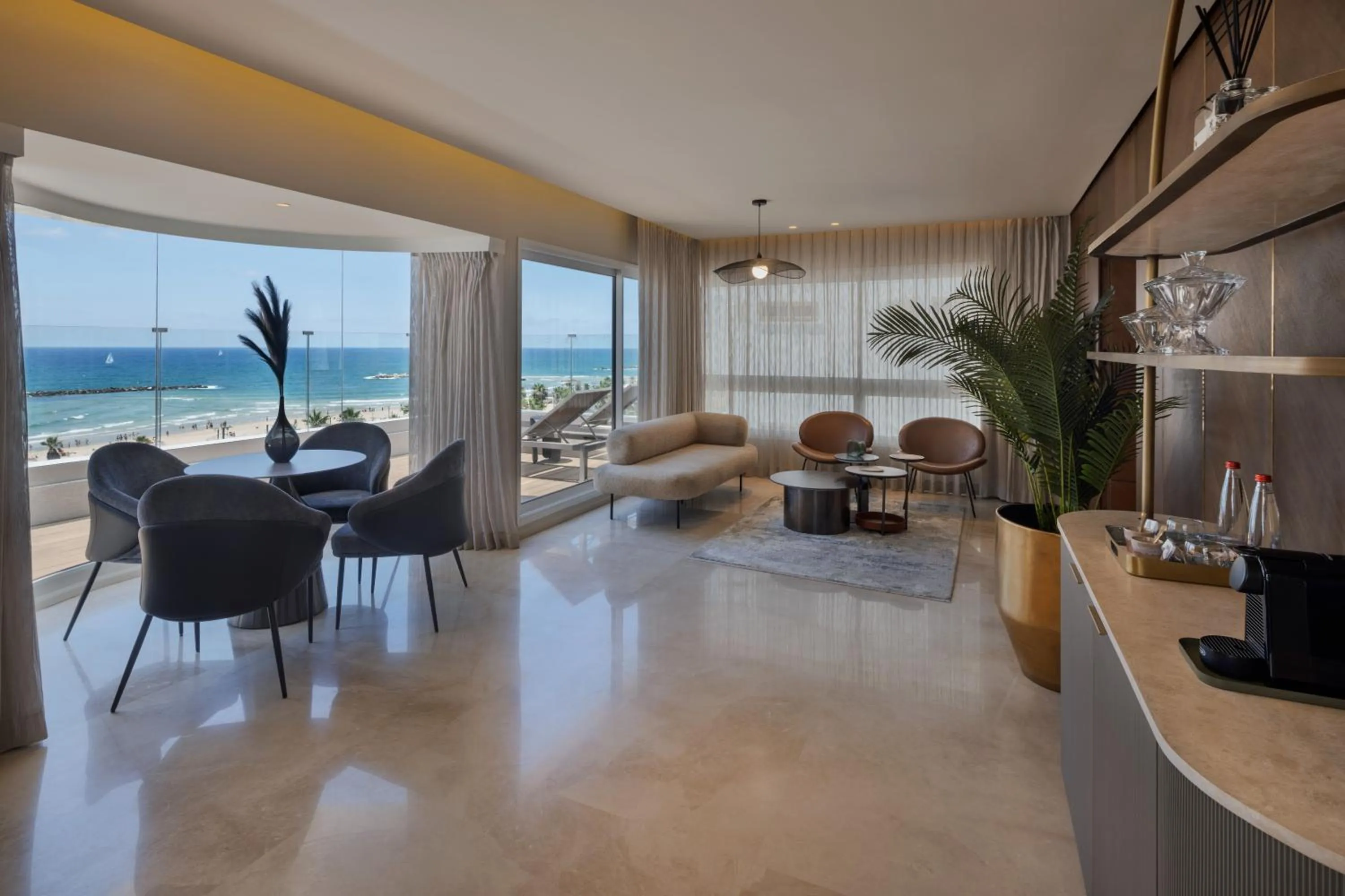 Seating area in Jewel TLV Hotel