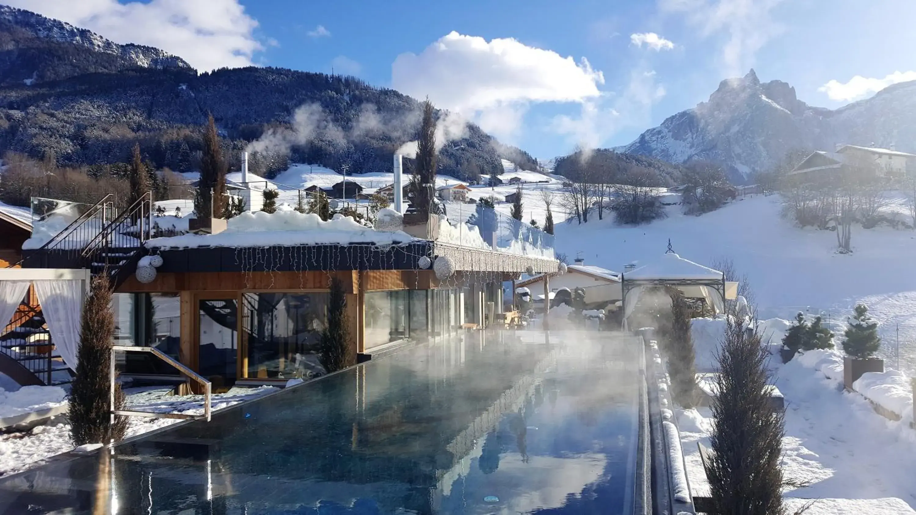 Swimming pool in ABINEA Dolomiti Romantic SPA Swimming pool in ABINEA Dolomiti Romantic SPA