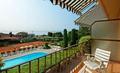 Balcony/Terrace, Pool View in Hotel Garden