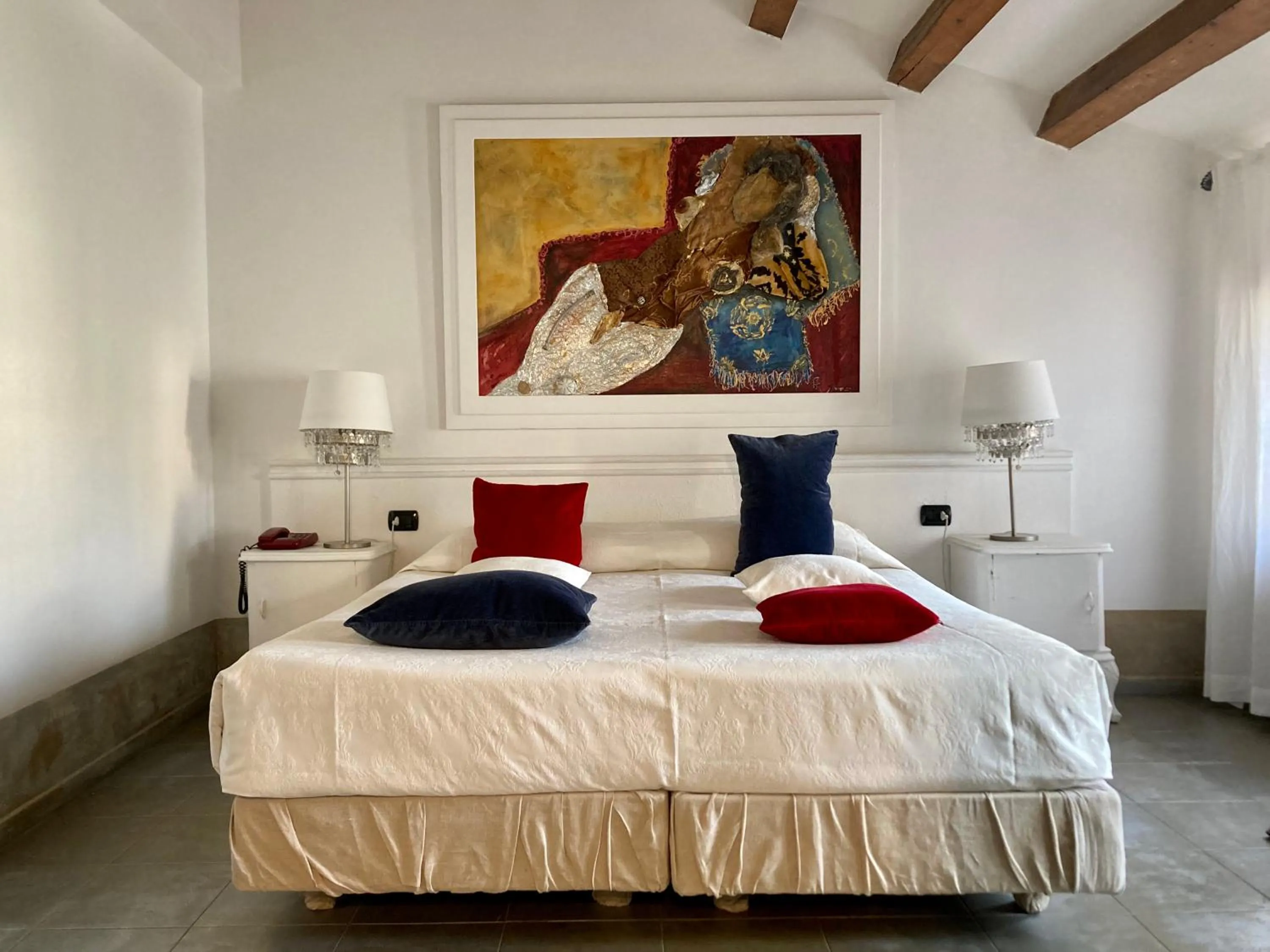 Bed in Art Hotel Al Fagiano