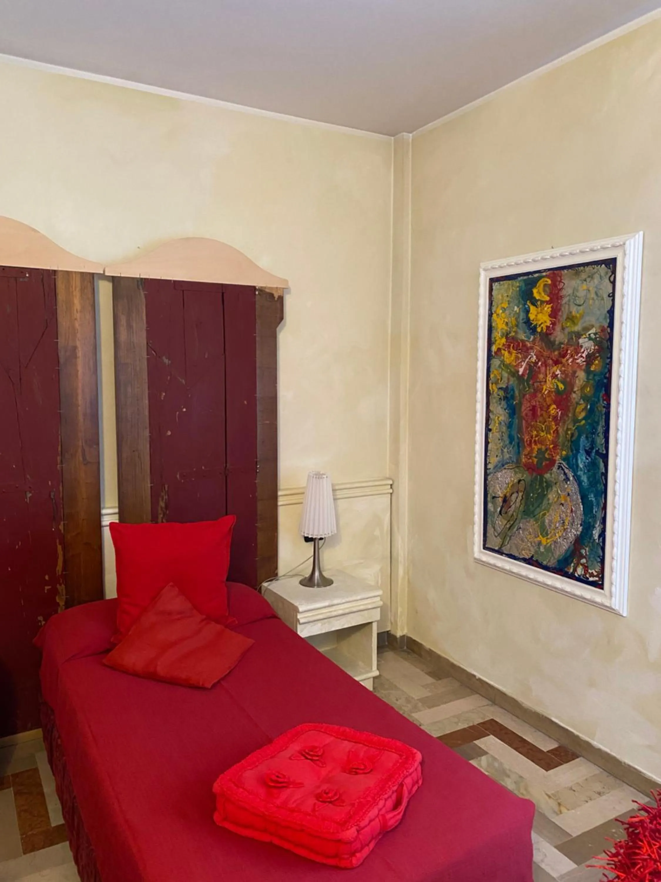 Bed in Art Hotel Al Fagiano