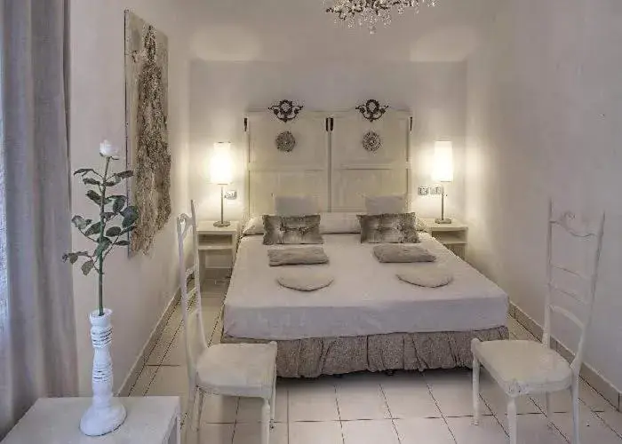 Bed in Art Hotel Al Fagiano Bed in Art Hotel Al Fagiano