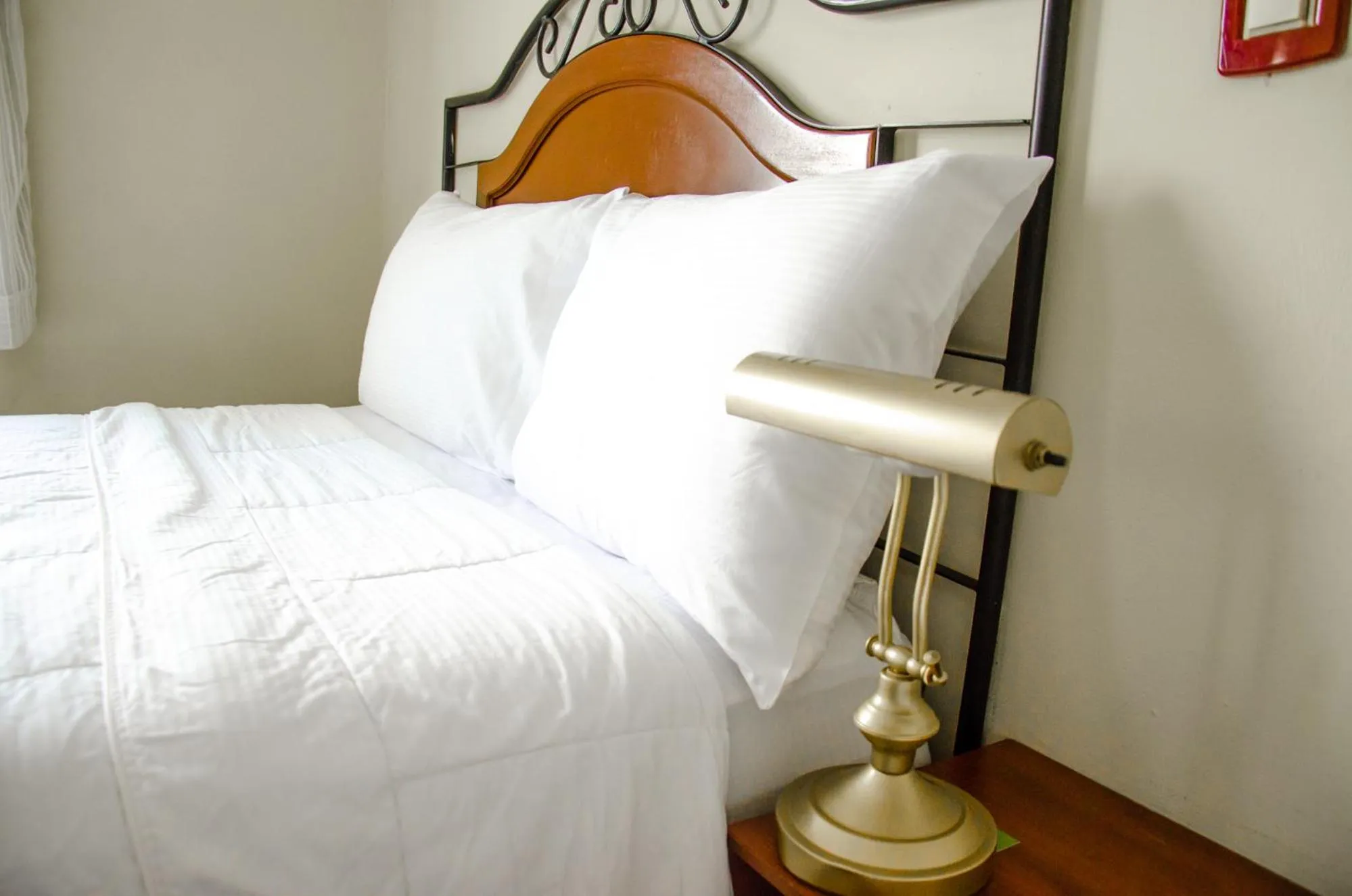 Bed in Hotel Gardenia Inn