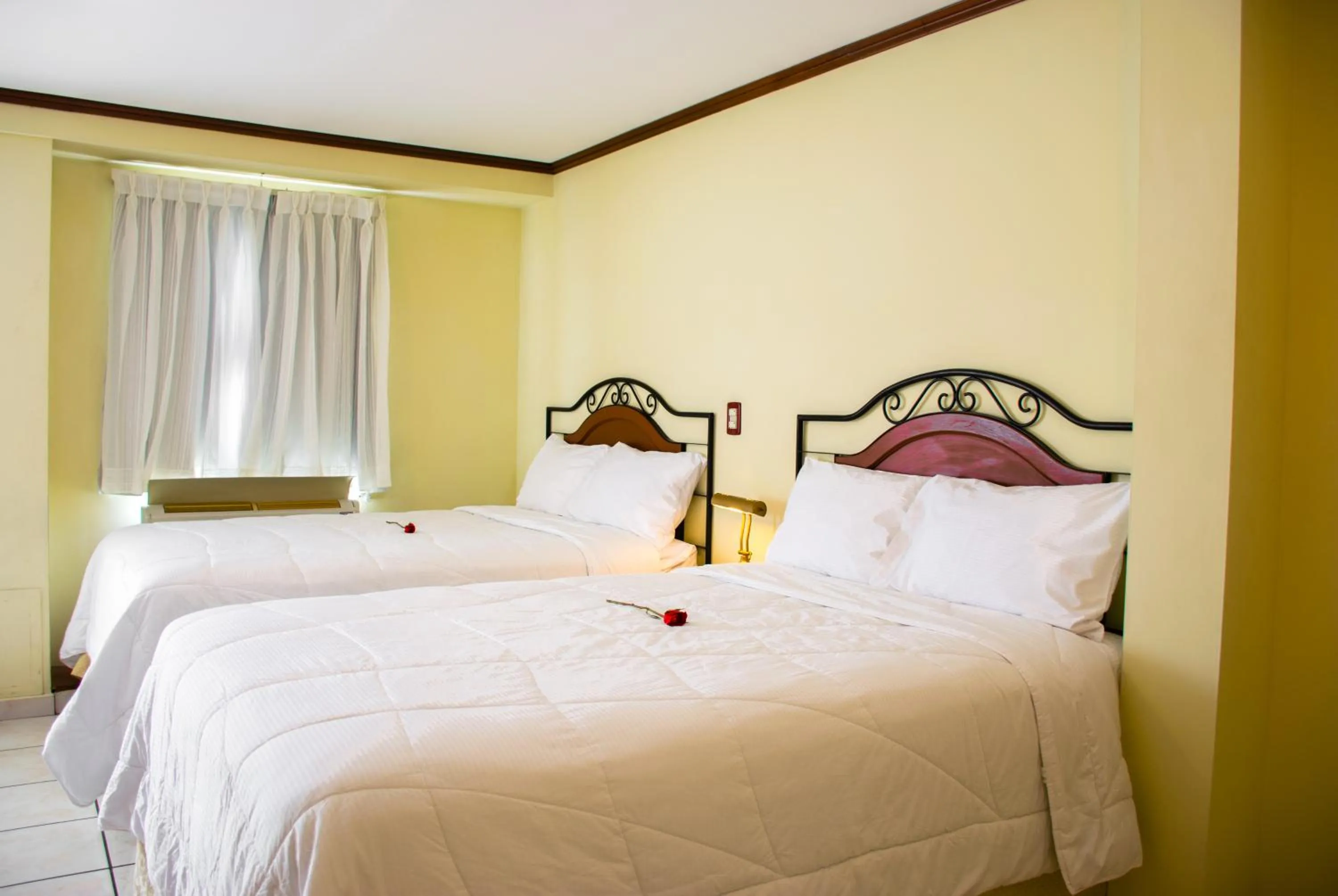 Bed in Hotel Gardenia Inn