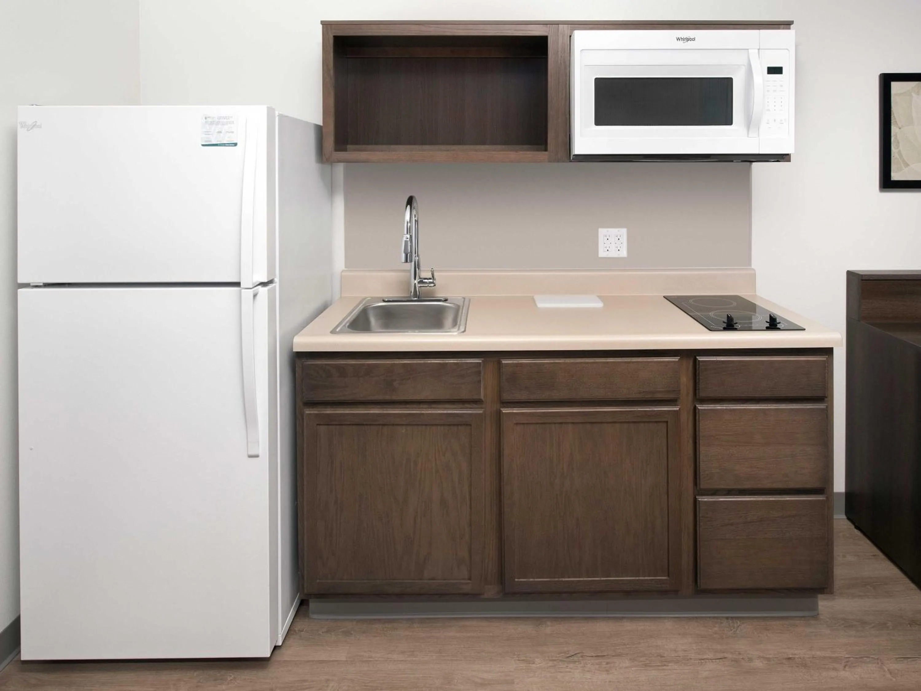 Kitchen or kitchenette in WoodSpring Suites Fargo North Near NDSU