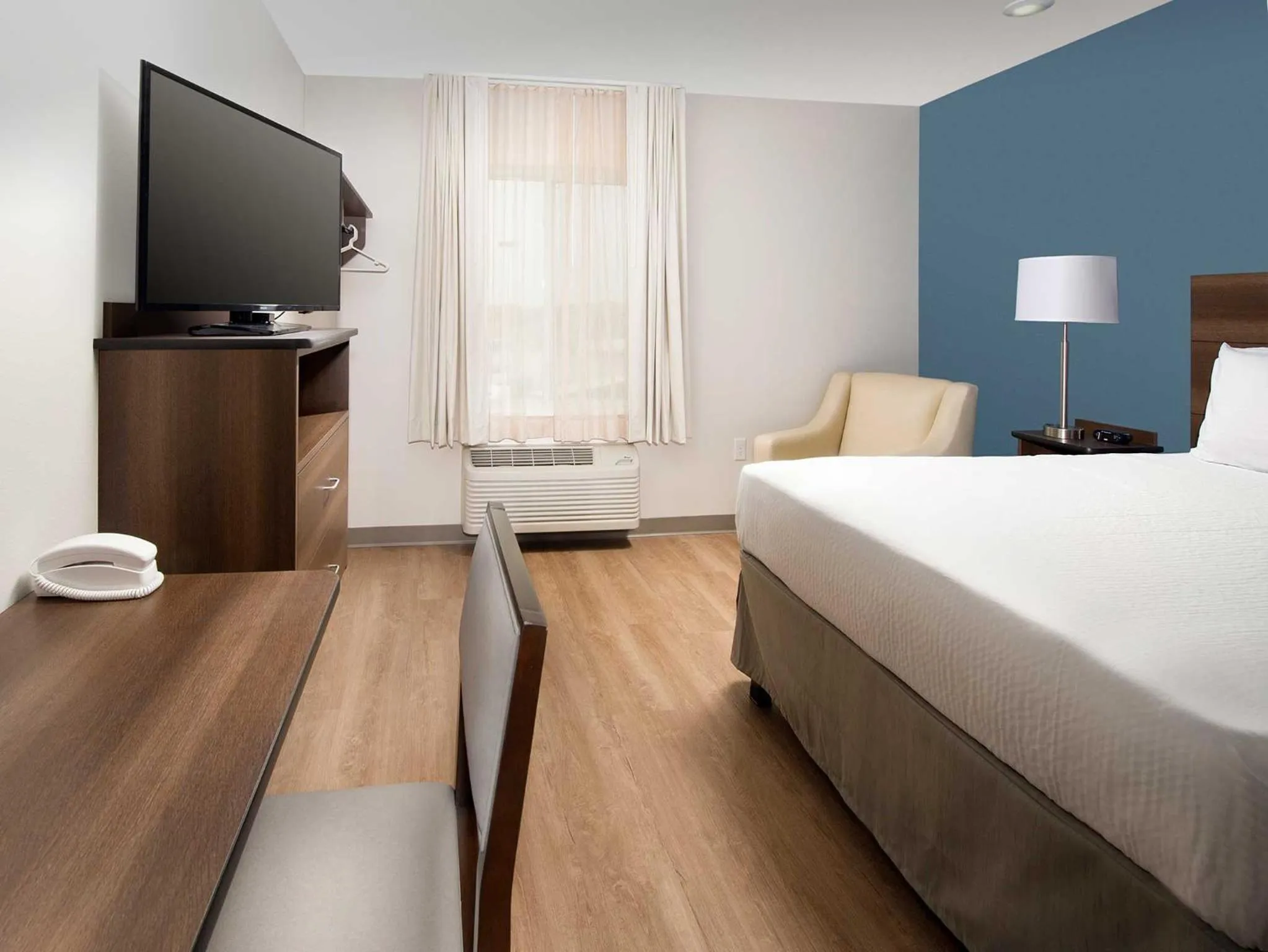 Photo of the whole room, Bed in WoodSpring Suites Fargo North Near NDSU