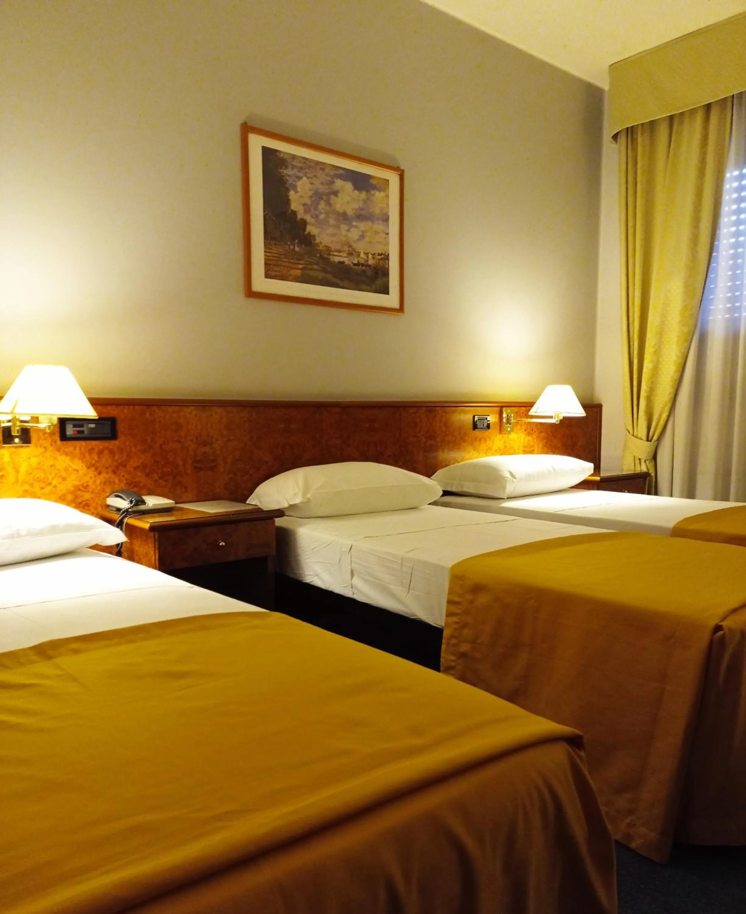 Bed in Hotel Motel Europa