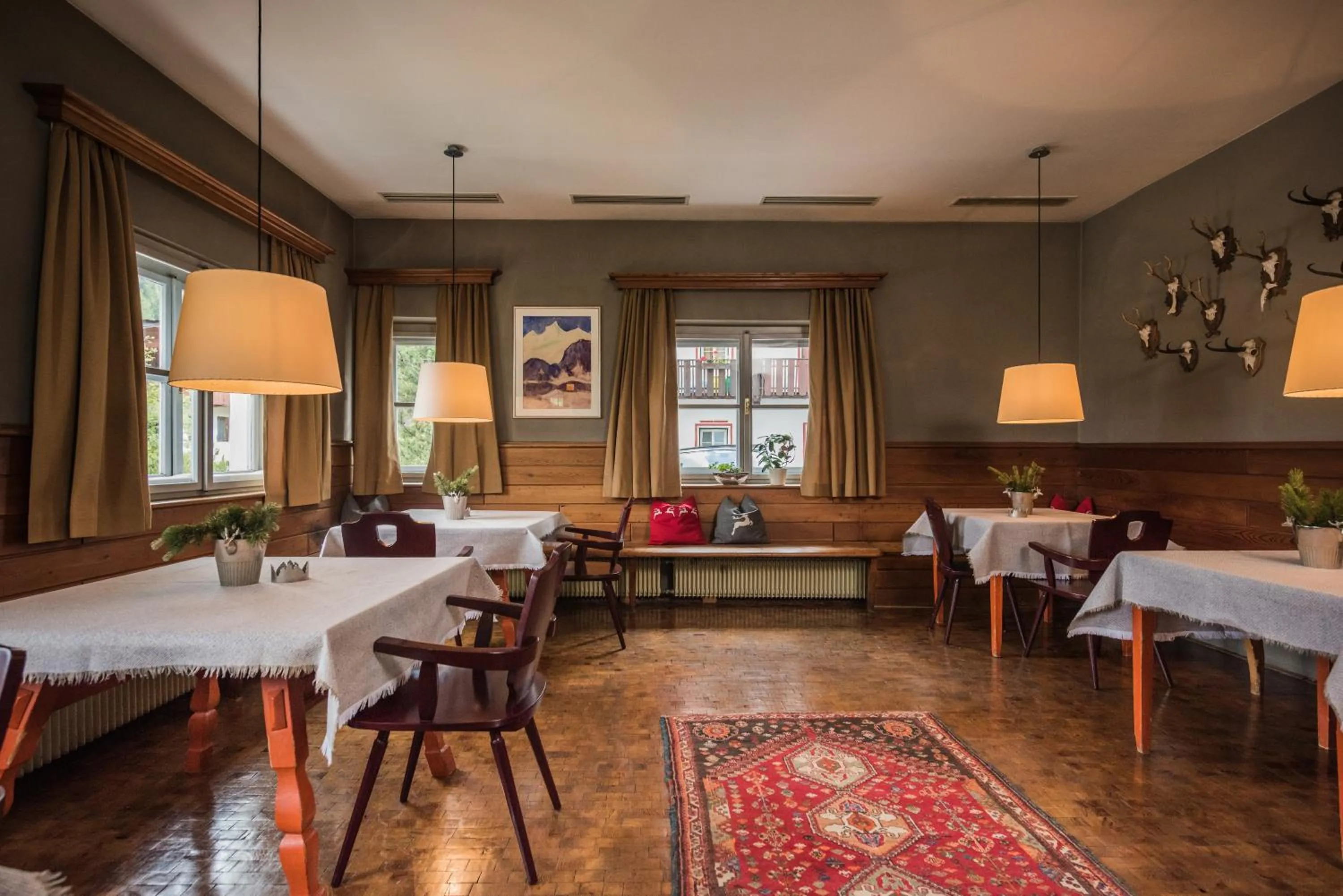 Communal lounge/ TV room in Hotel Tre Cime Sesto - Sexten