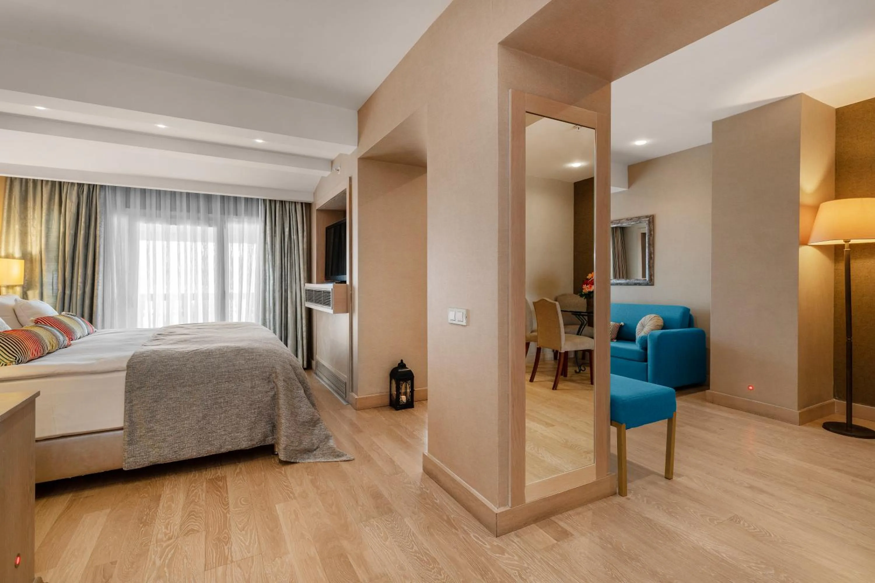 Living room, Bed in Marti Resort Deluxe Hotel