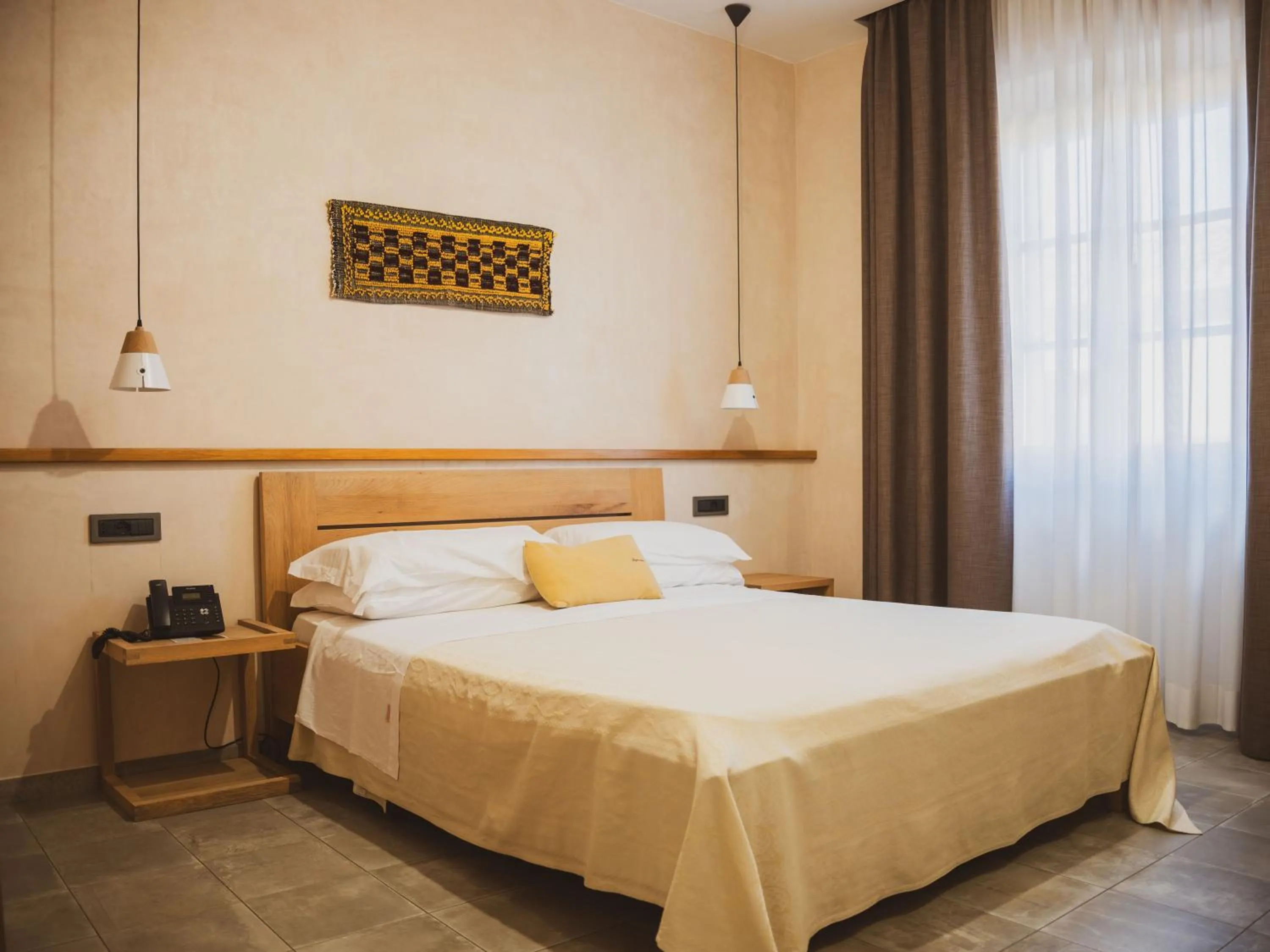 Bed in Tramas Hotel & Spa