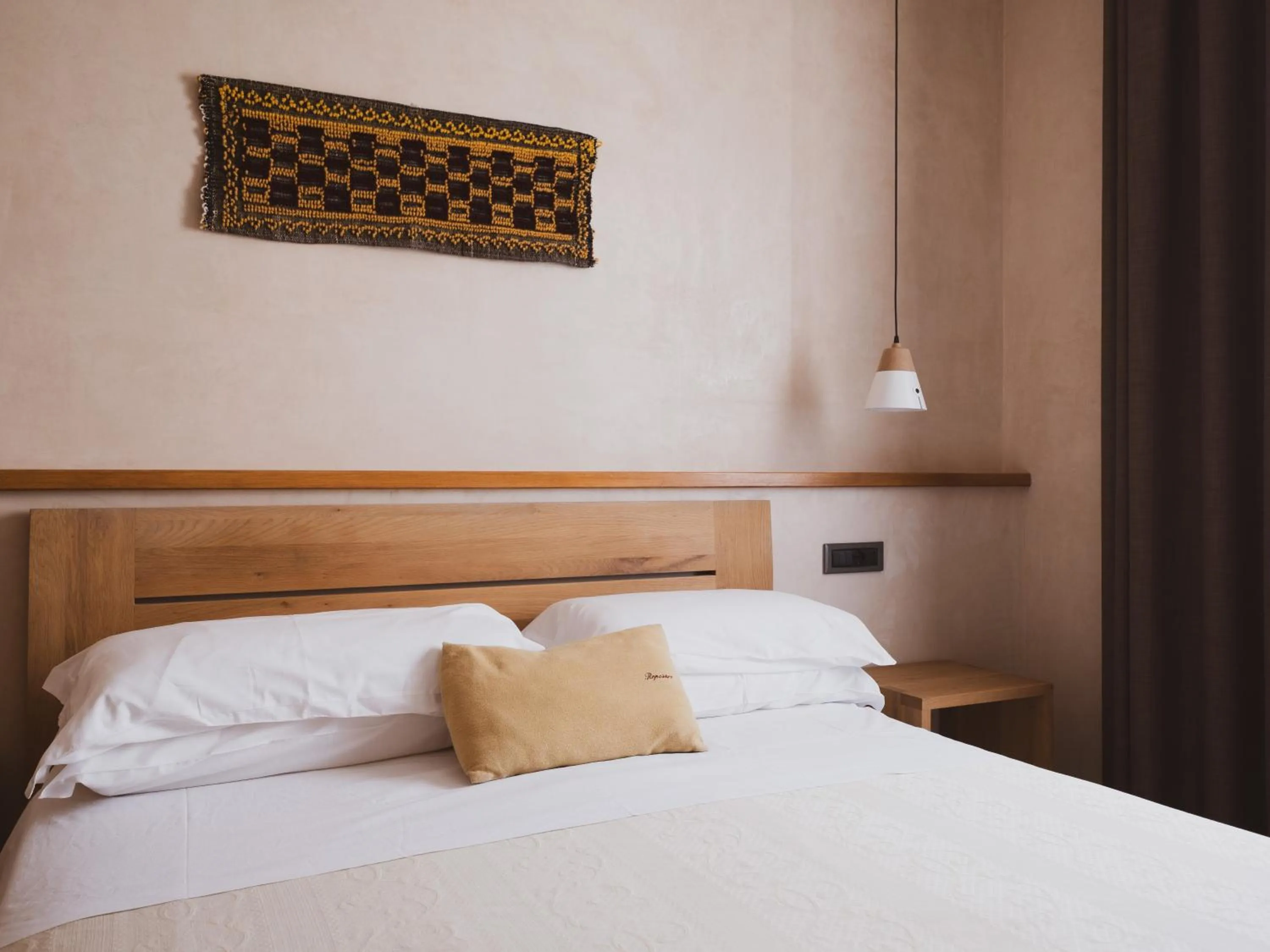 Bed in Tramas Hotel & Spa