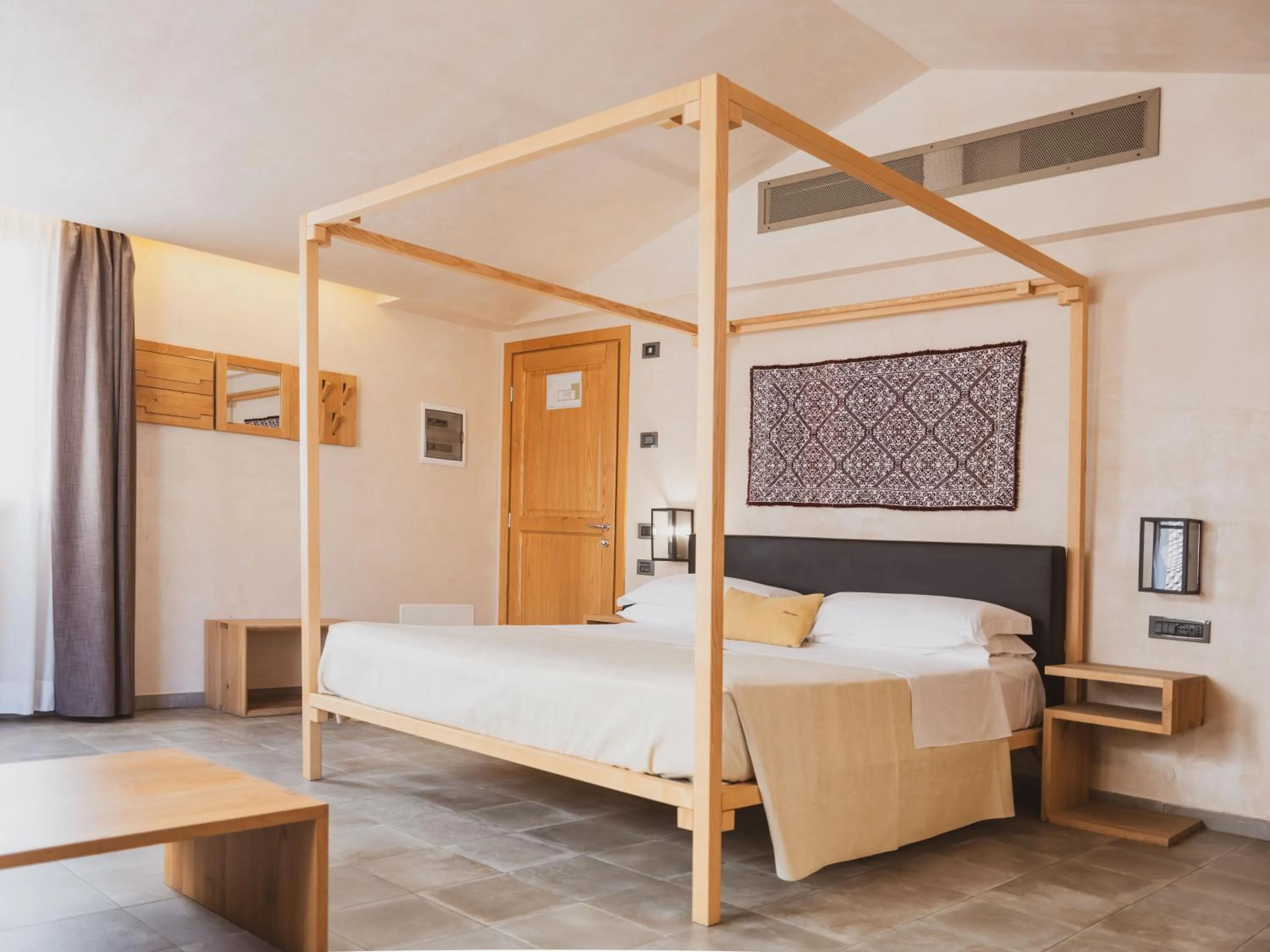 Bed in Tramas Hotel & Spa