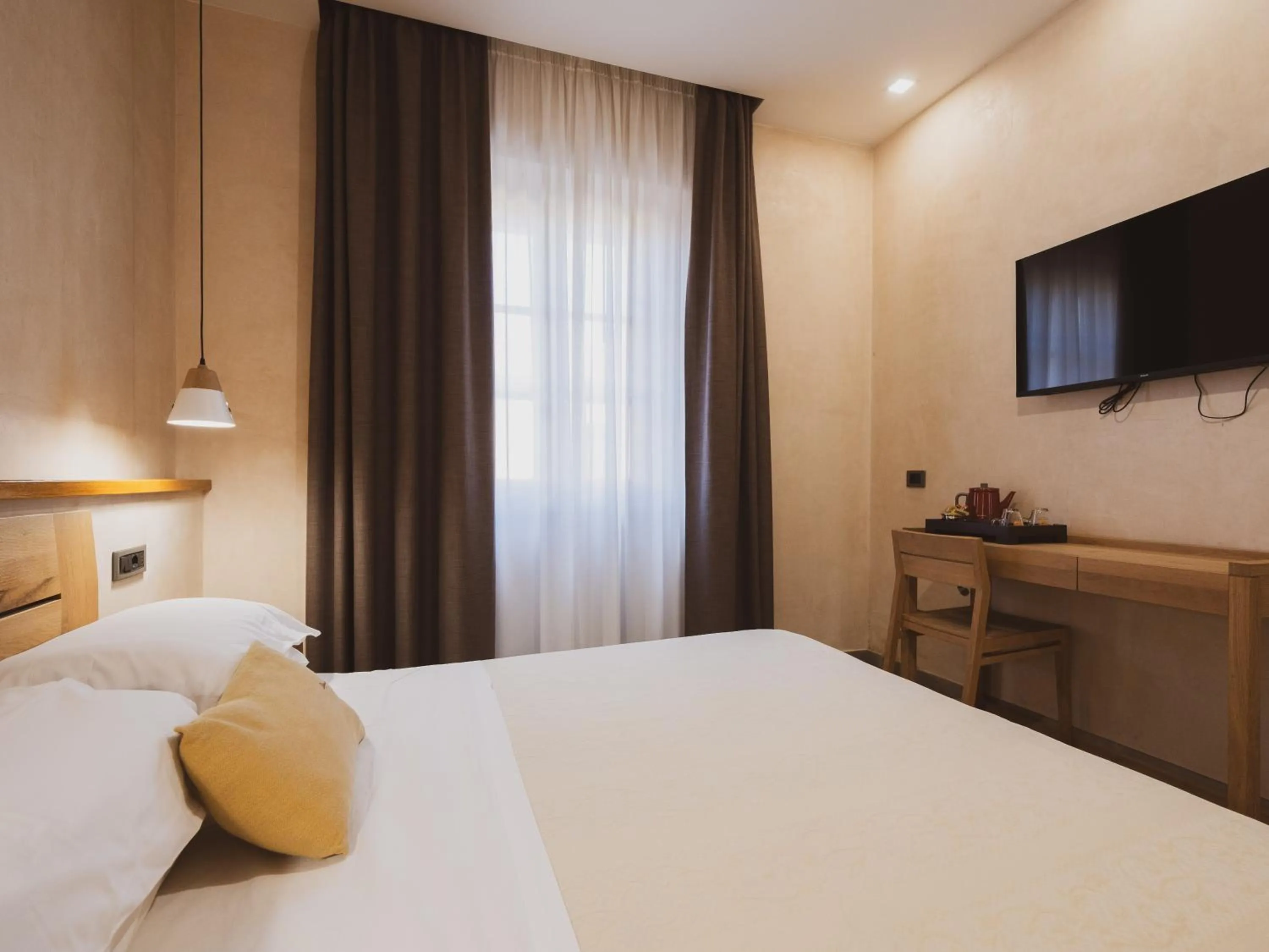 Bed in Tramas Hotel & Spa