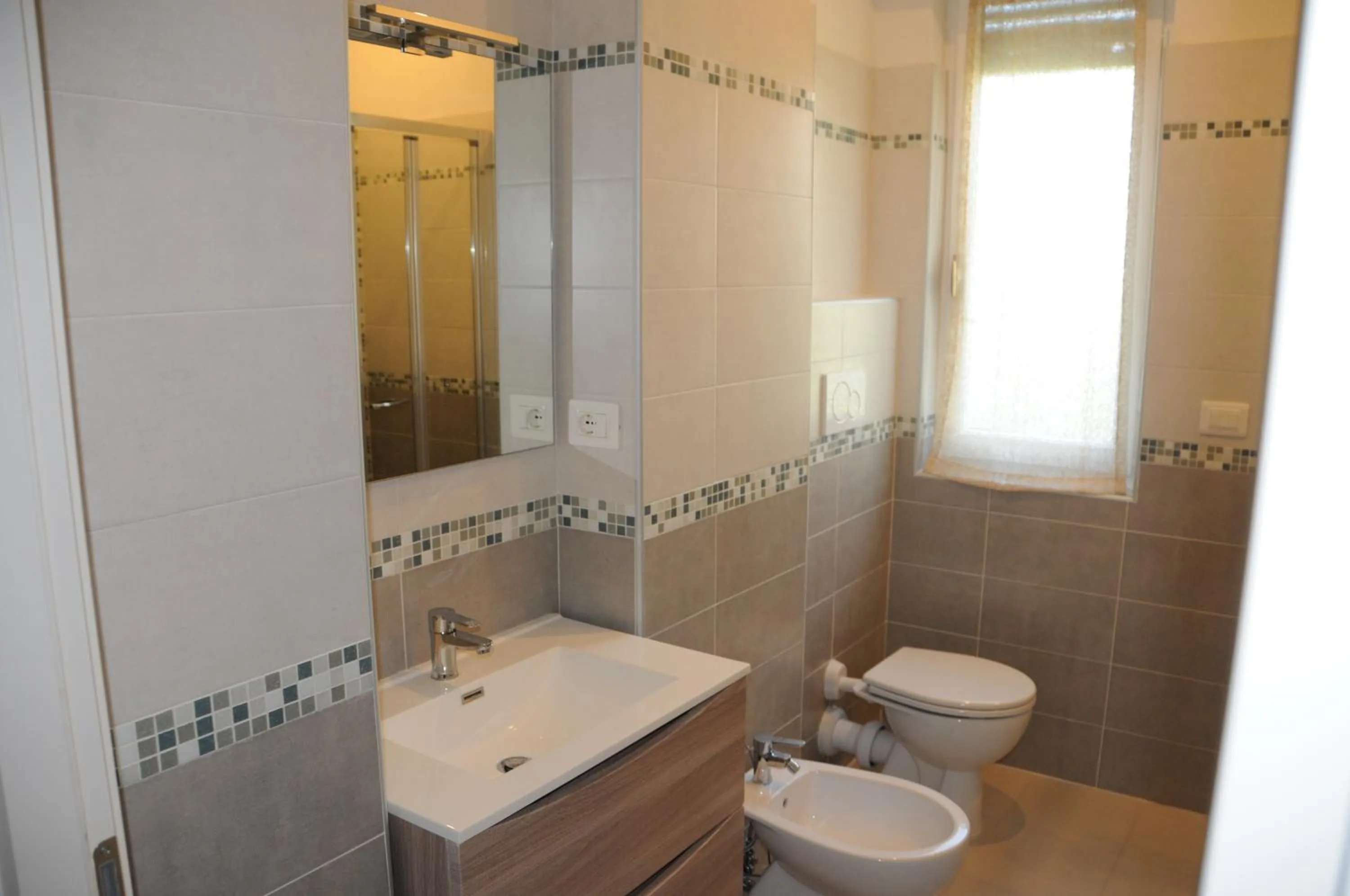 Toilet in Affittacamere La Perla