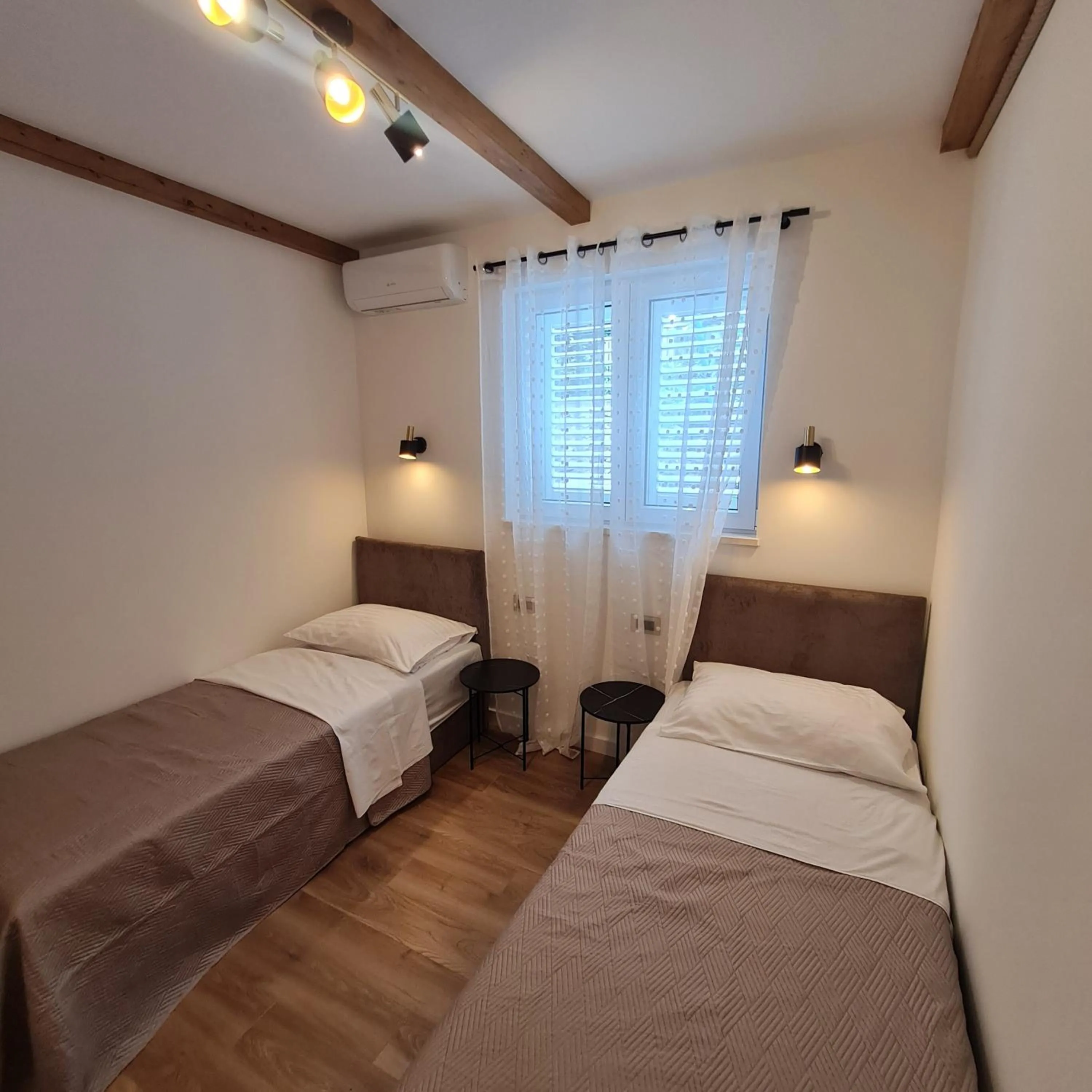 Bed in Apartment Mariniva