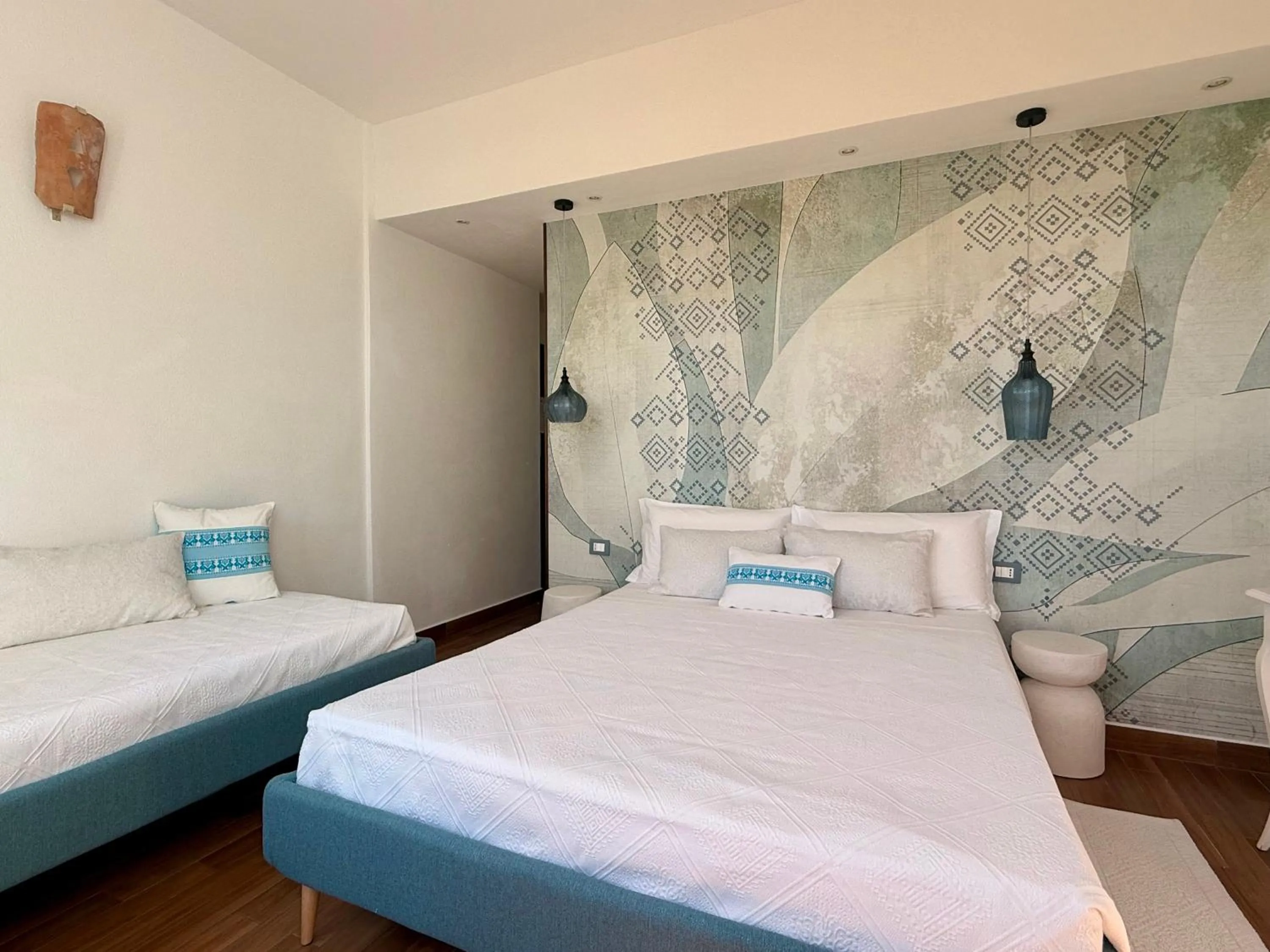 Bed in PALMASERA CHARMING - Rooms & Suites