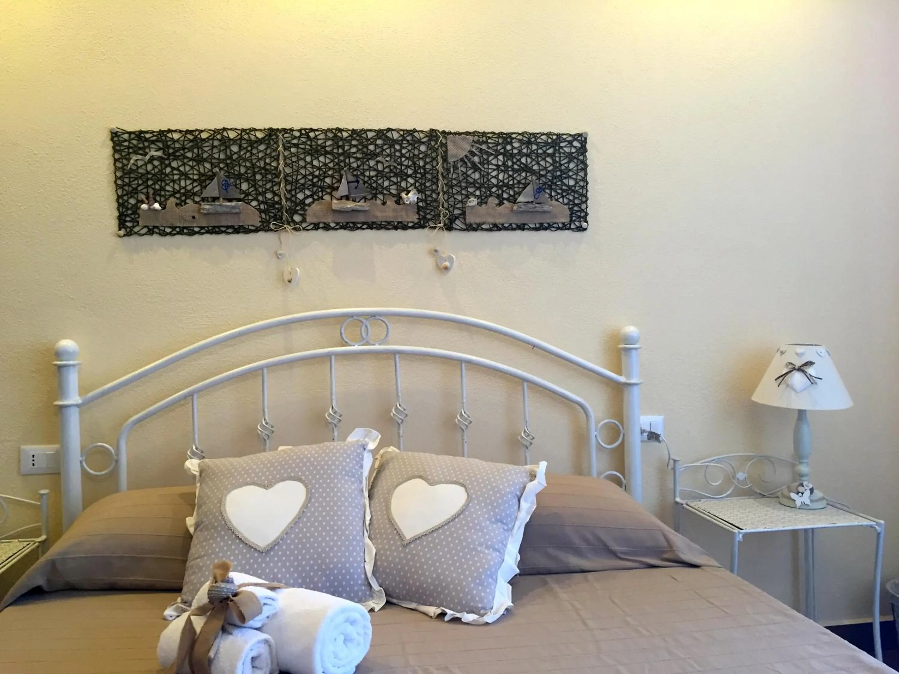 Bed in Palmasera Charming Rooms