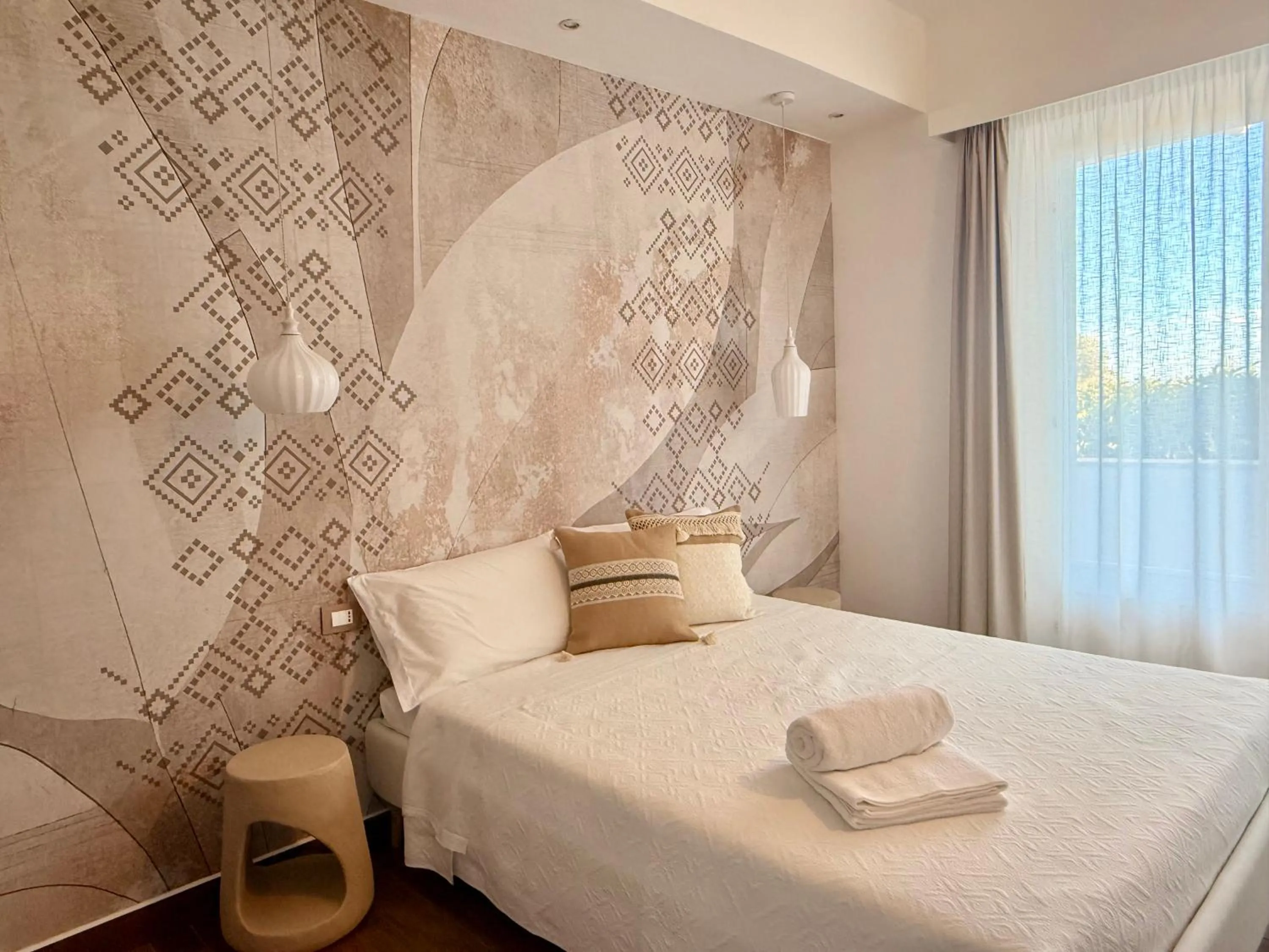 Bed in PALMASERA CHARMING - Rooms & Suites