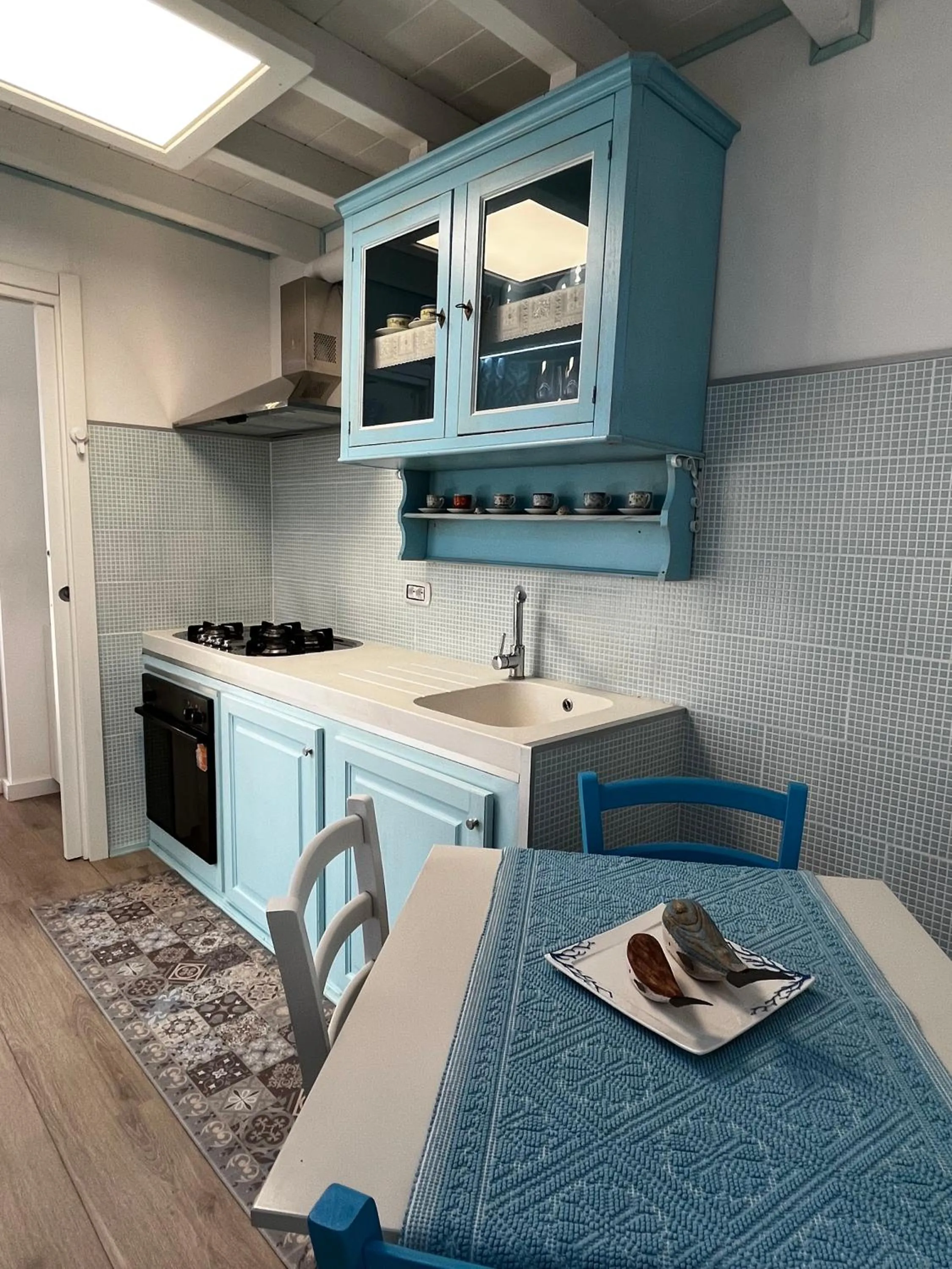 Kitchen or kitchenette in Palmasera Charming Rooms