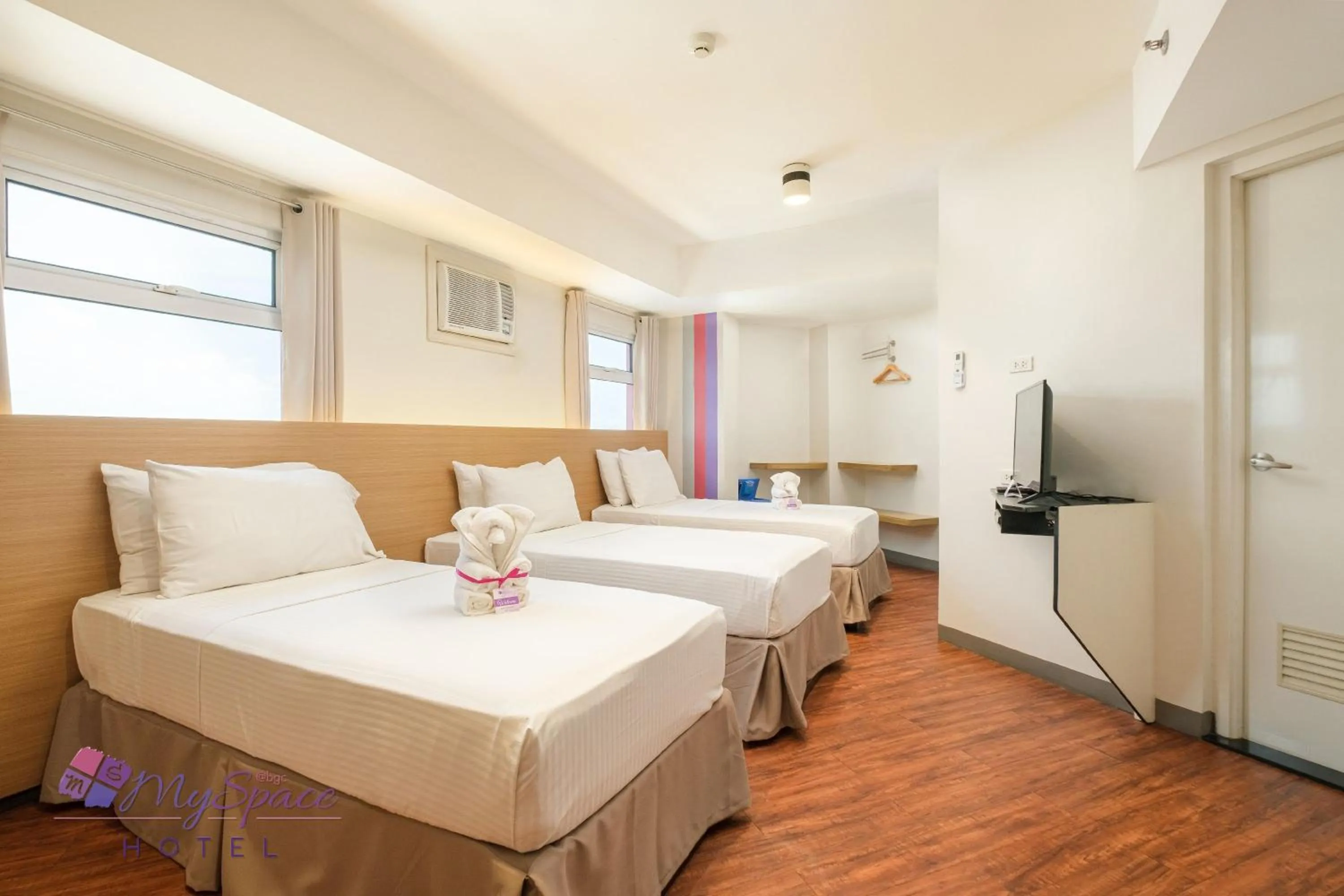 Photo of the whole room, Bed in MySpace Hotel @BGC