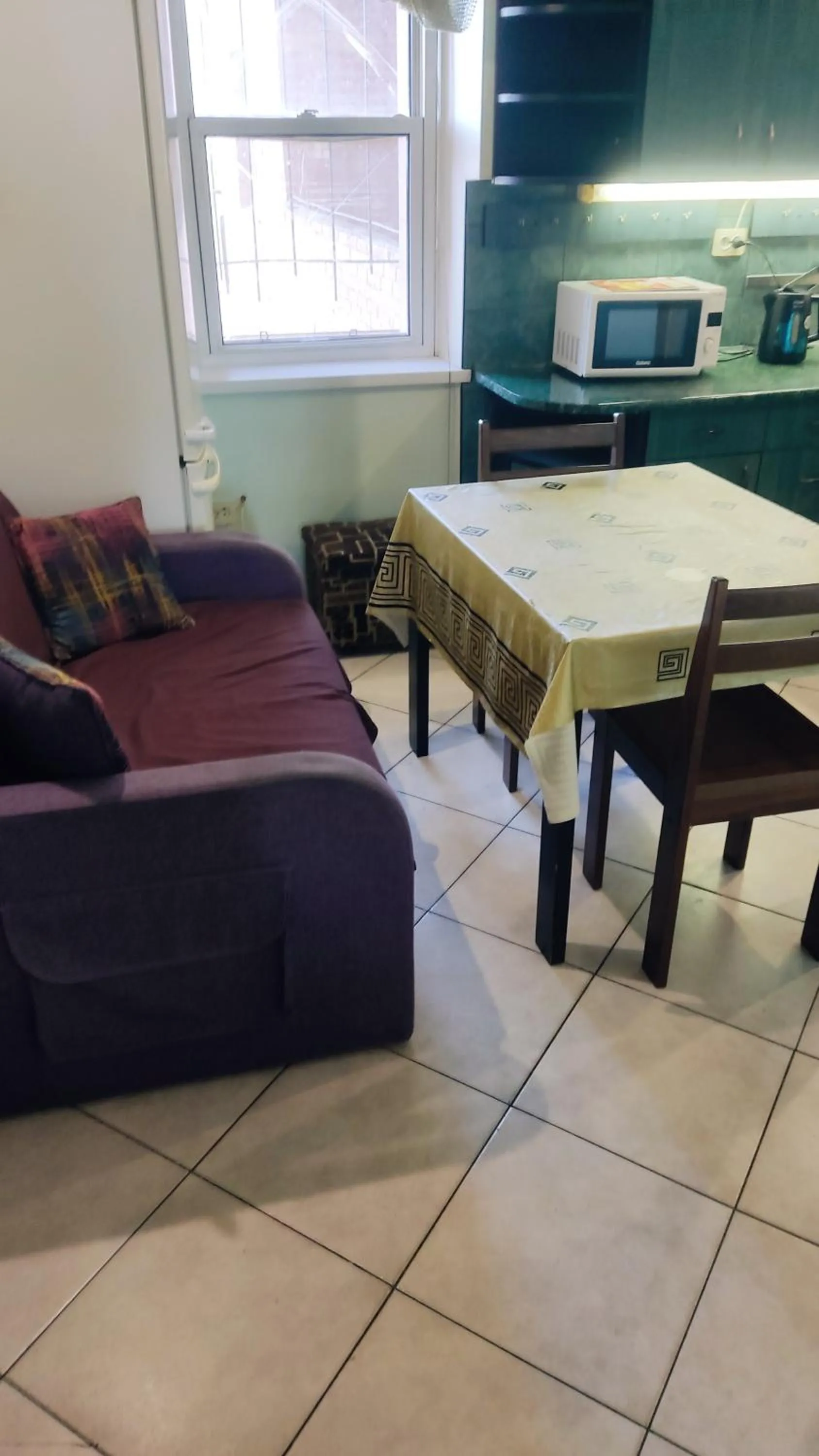Kitchen or kitchenette in Apartment on Privokzalnaya 2/1