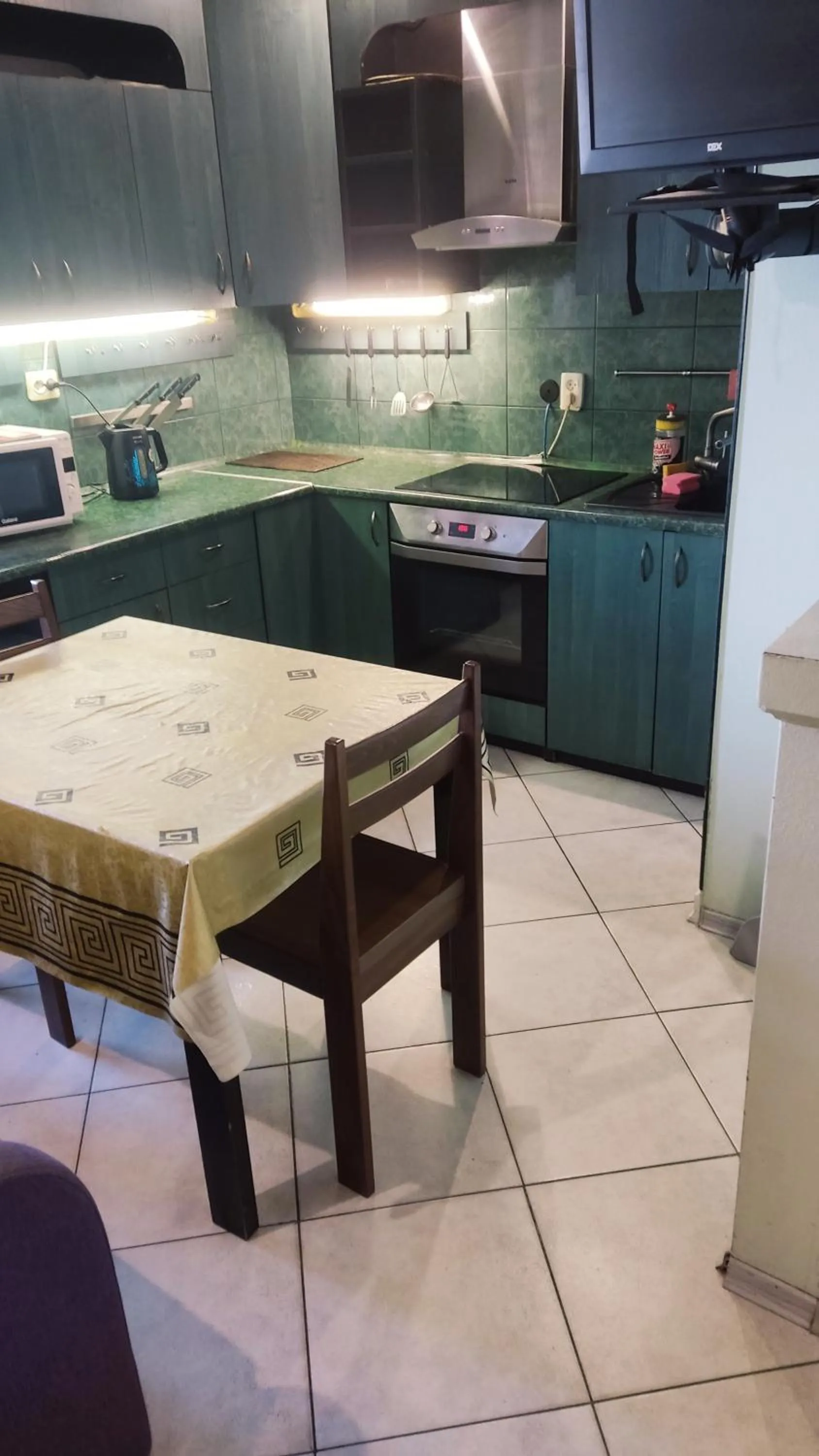 Kitchen or kitchenette in Apartment on Privokzalnaya 2/1