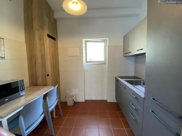 Kitchen or kitchenette in Residence Parco Del Garda