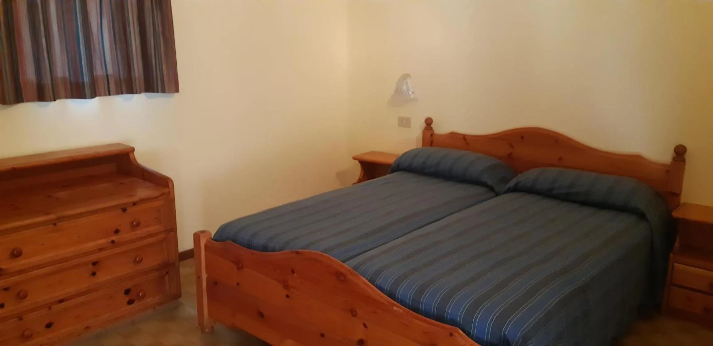 Bedroom in Residence Parco Del Garda