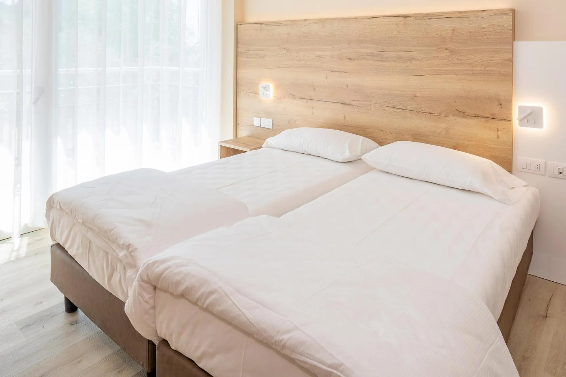 Bedroom in Residence Parco Del Garda